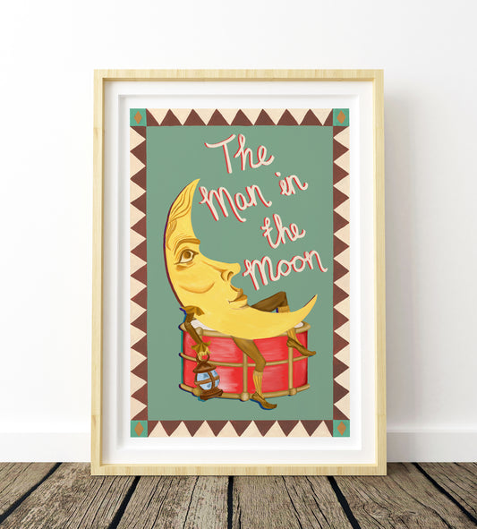 An painted illustration of the man in the moon with a decorative boarder in a light wood frame