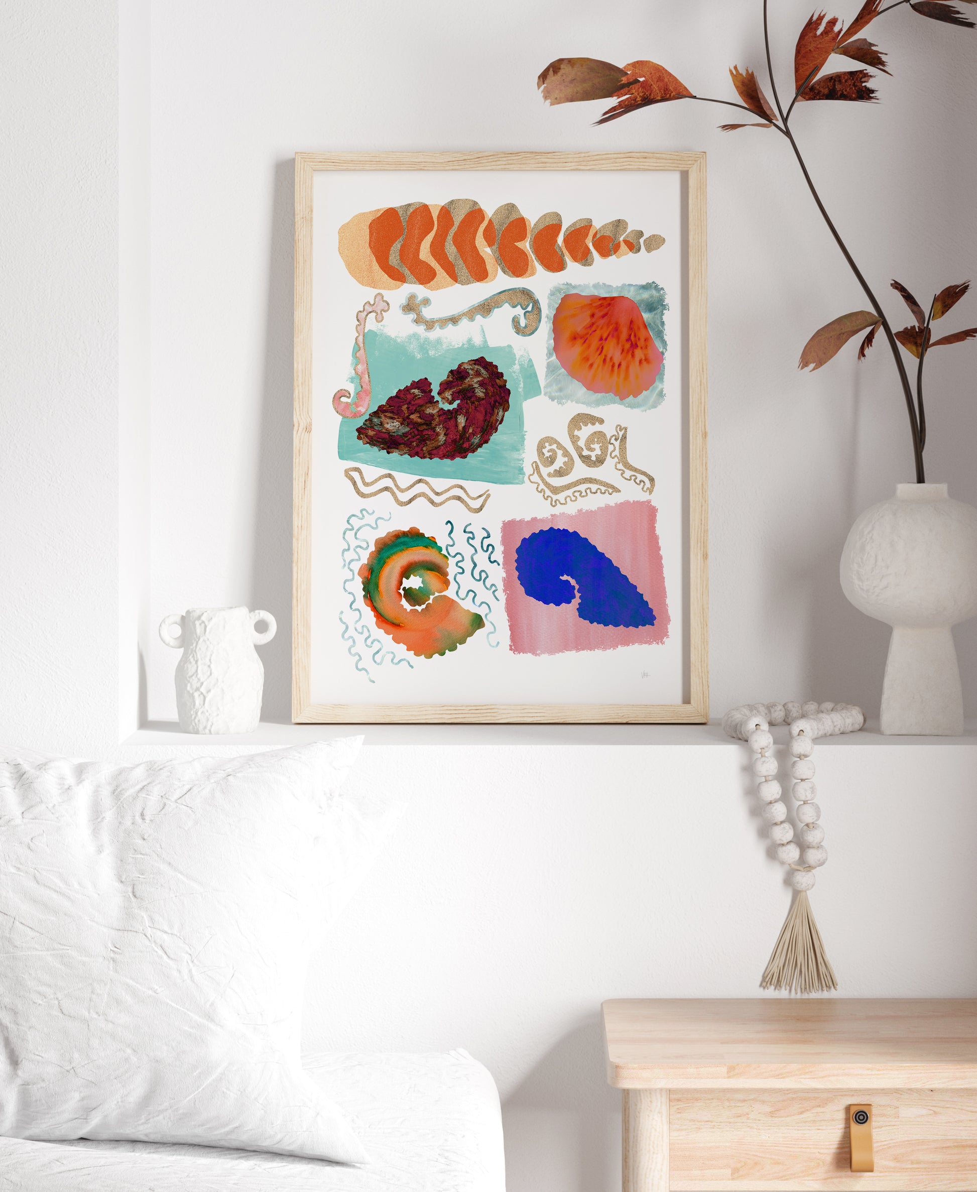 Colorful abstract art print on a wall in a living room setting.