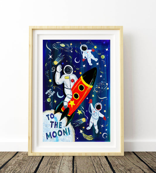 Framed artwork of an astronaut and rocket ship with 'To the Moon!' text against a space-themed background.