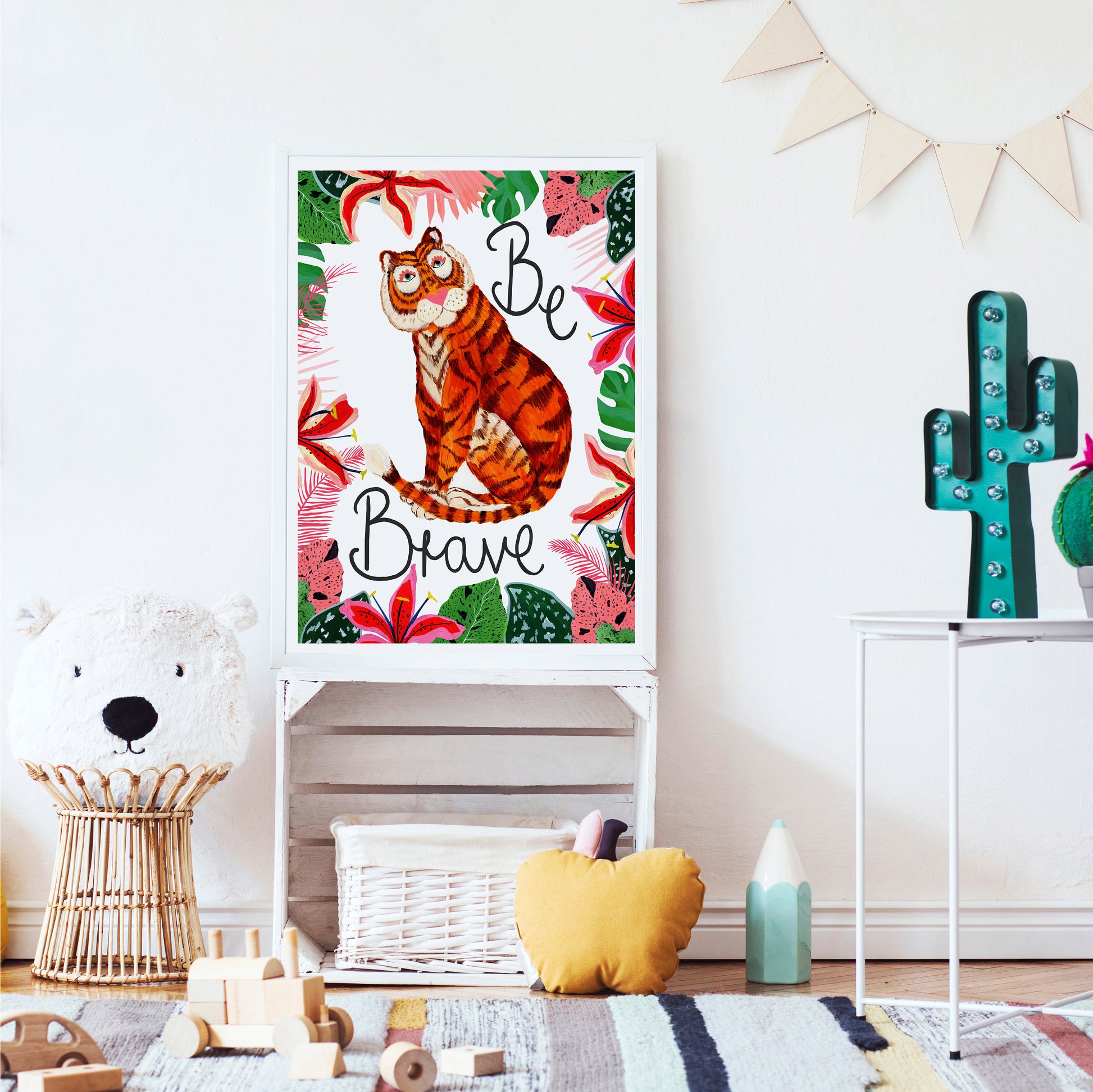 Children's room with a motivational poster of a tiger, toys, and decorative items.