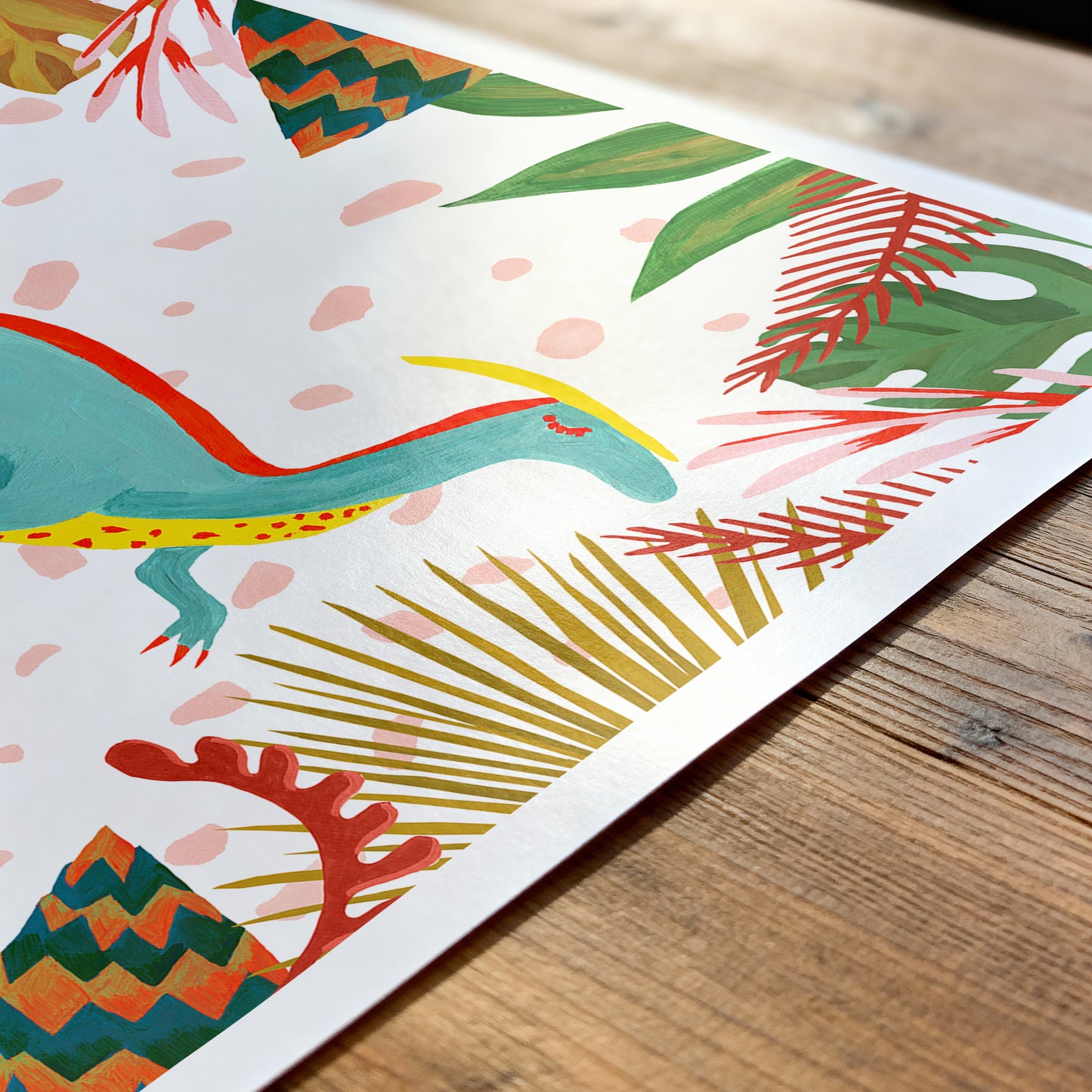 Colorful dinosaur illustration on a white background with green leaves and red coral.