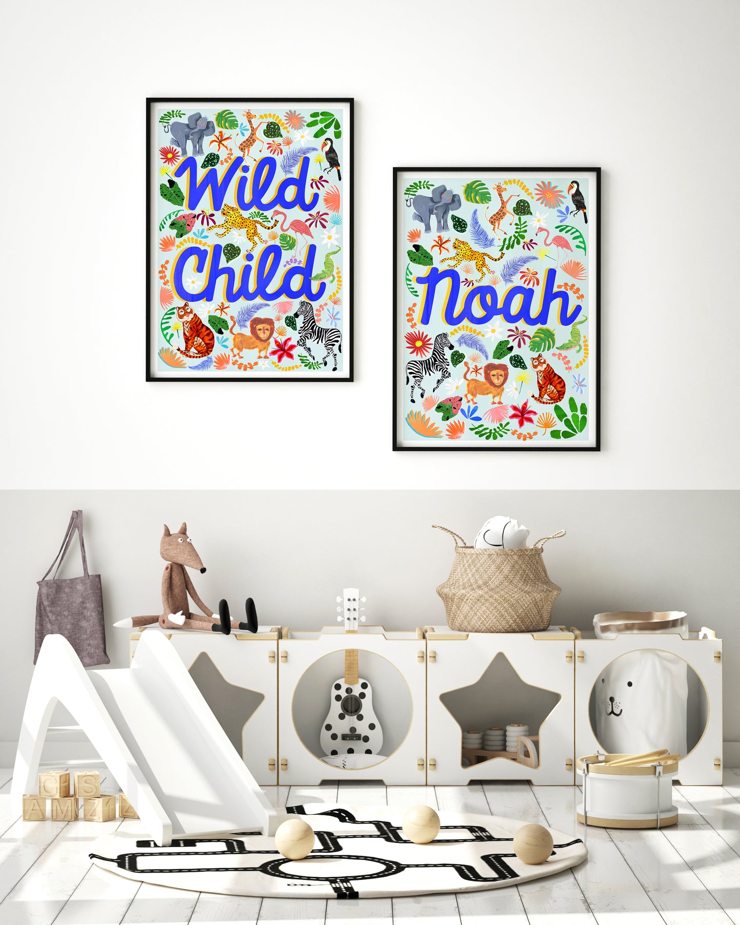 Two framed prints with animal illustrations and text in a child's room.