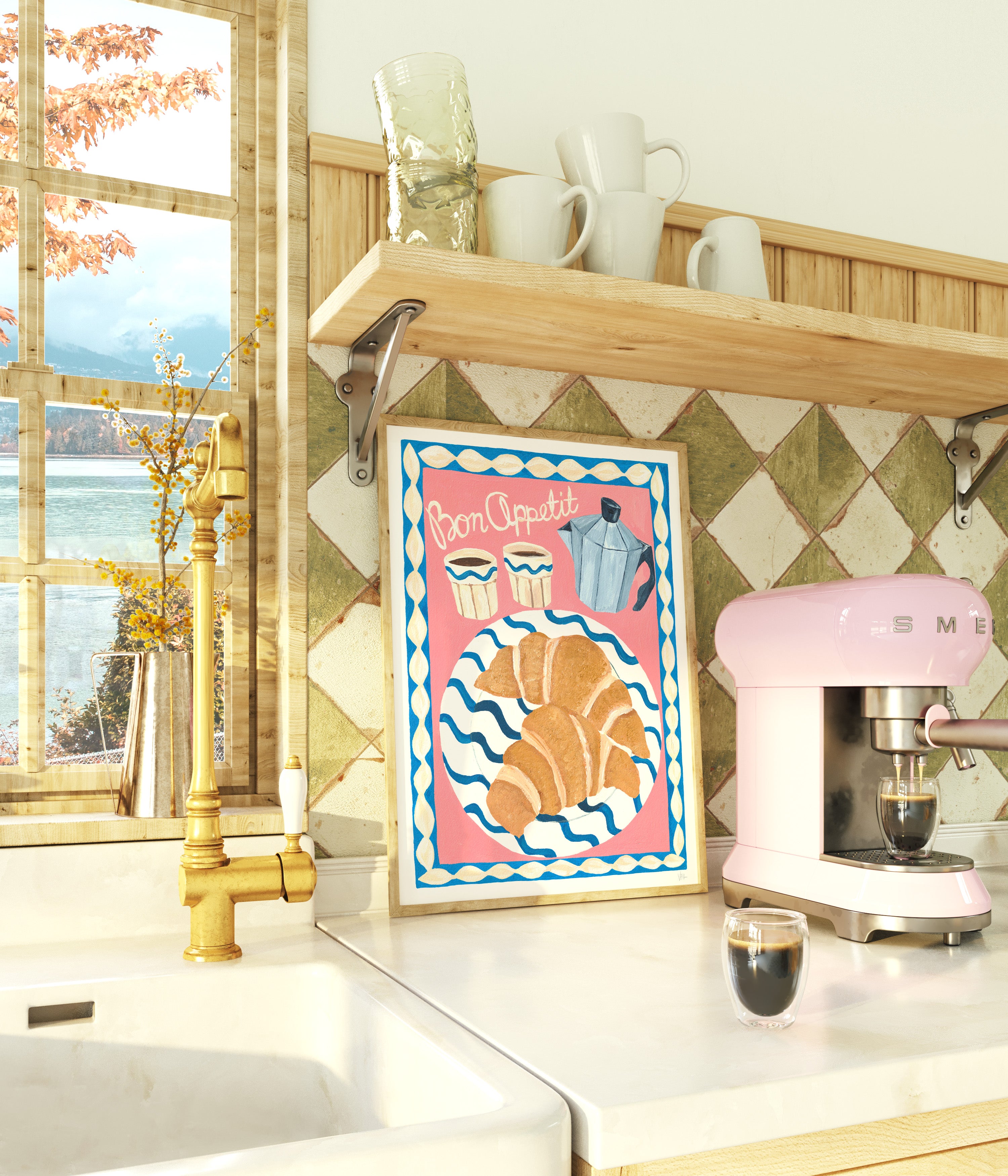 Kitchen counter with pink Smeg coffee machine, framed breakfast and coffee artwork, and window view.