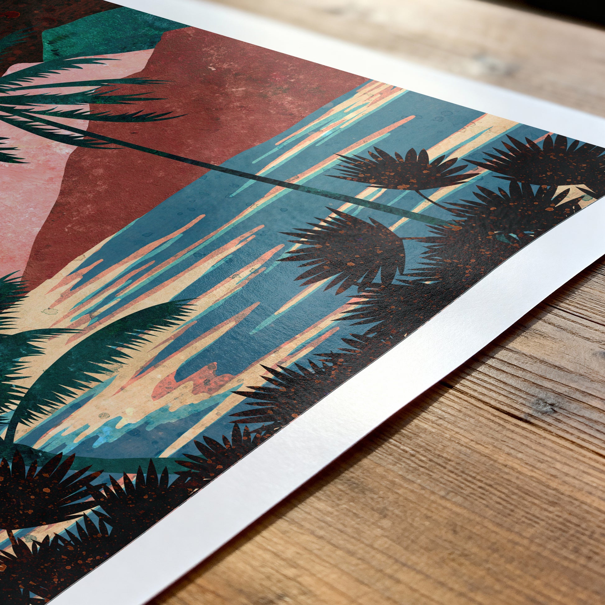 Art print with palm tree design on a wooden surface