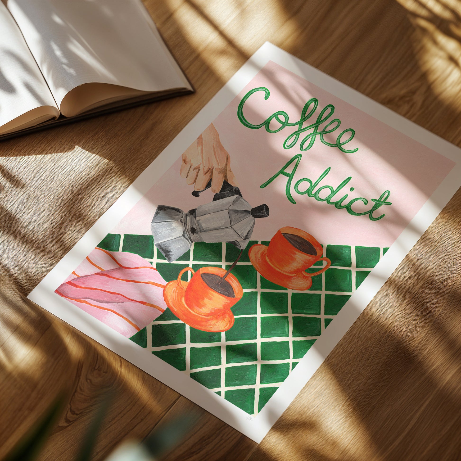 Poster with 'Coffee Addict' text and coffee-themed illustrations on a wooden surface.