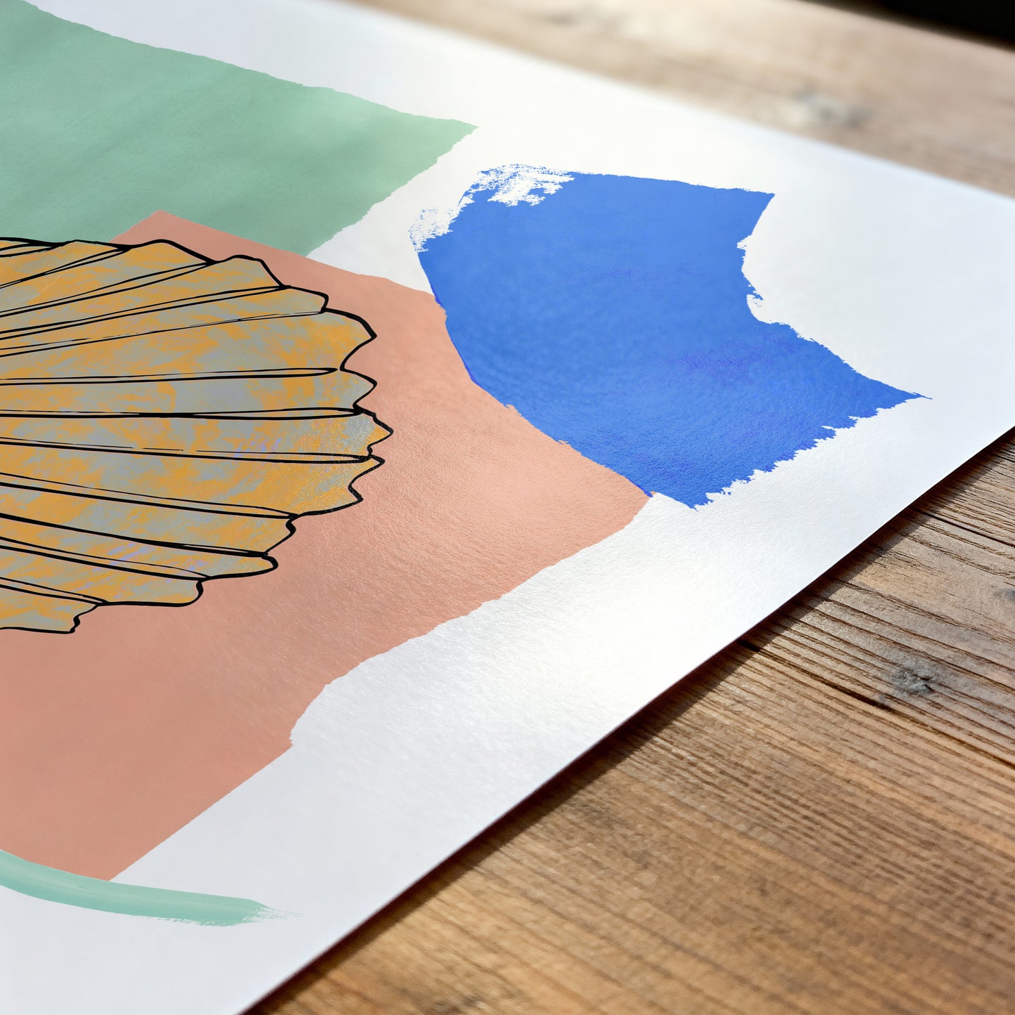 Colorful abstract art print on a wooden surface