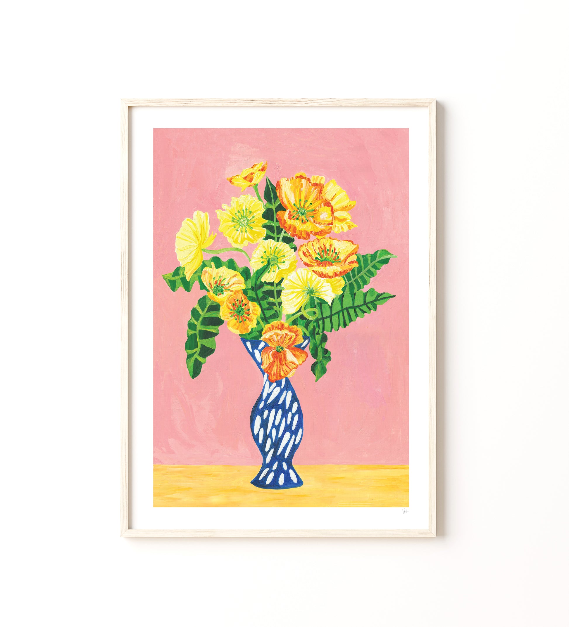 Framed artwork of a blue vase with yellow flowers on a pink background