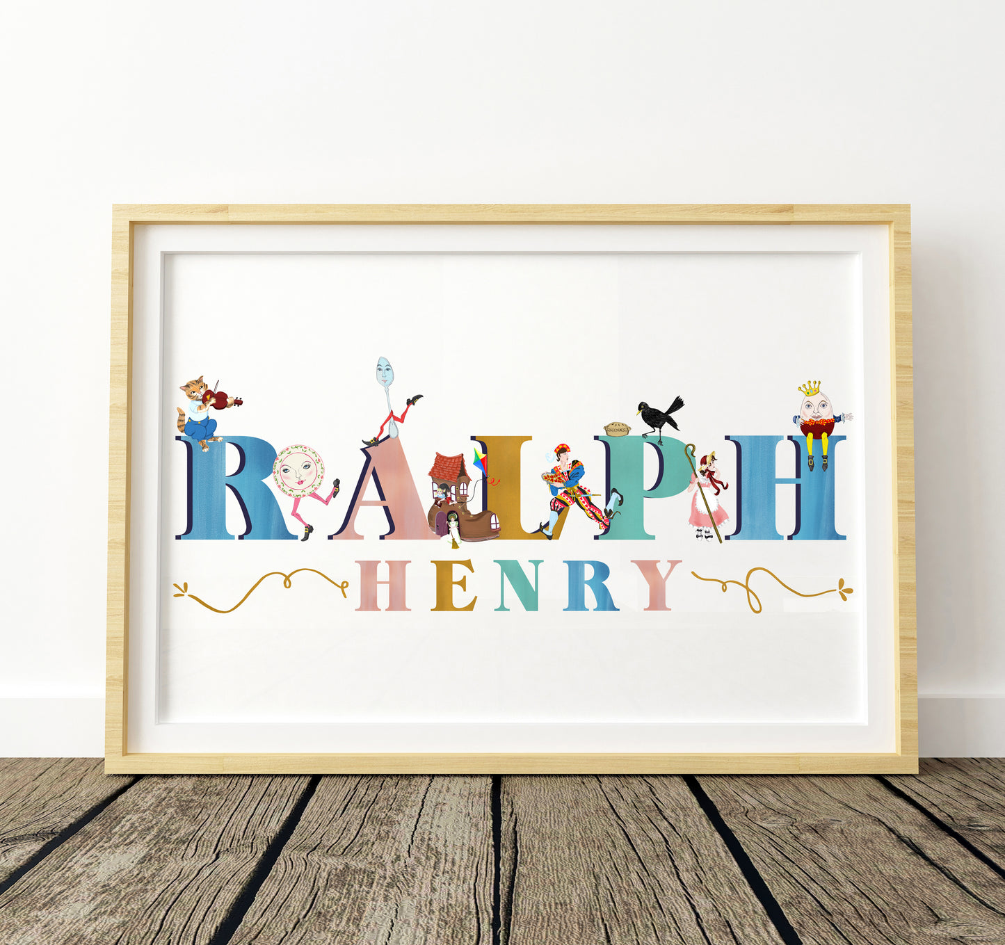 Framed artwork with colorful letters spelling 'RALPH HENRY' on a white background with nursery rhyme illustrations surrounding the letters.