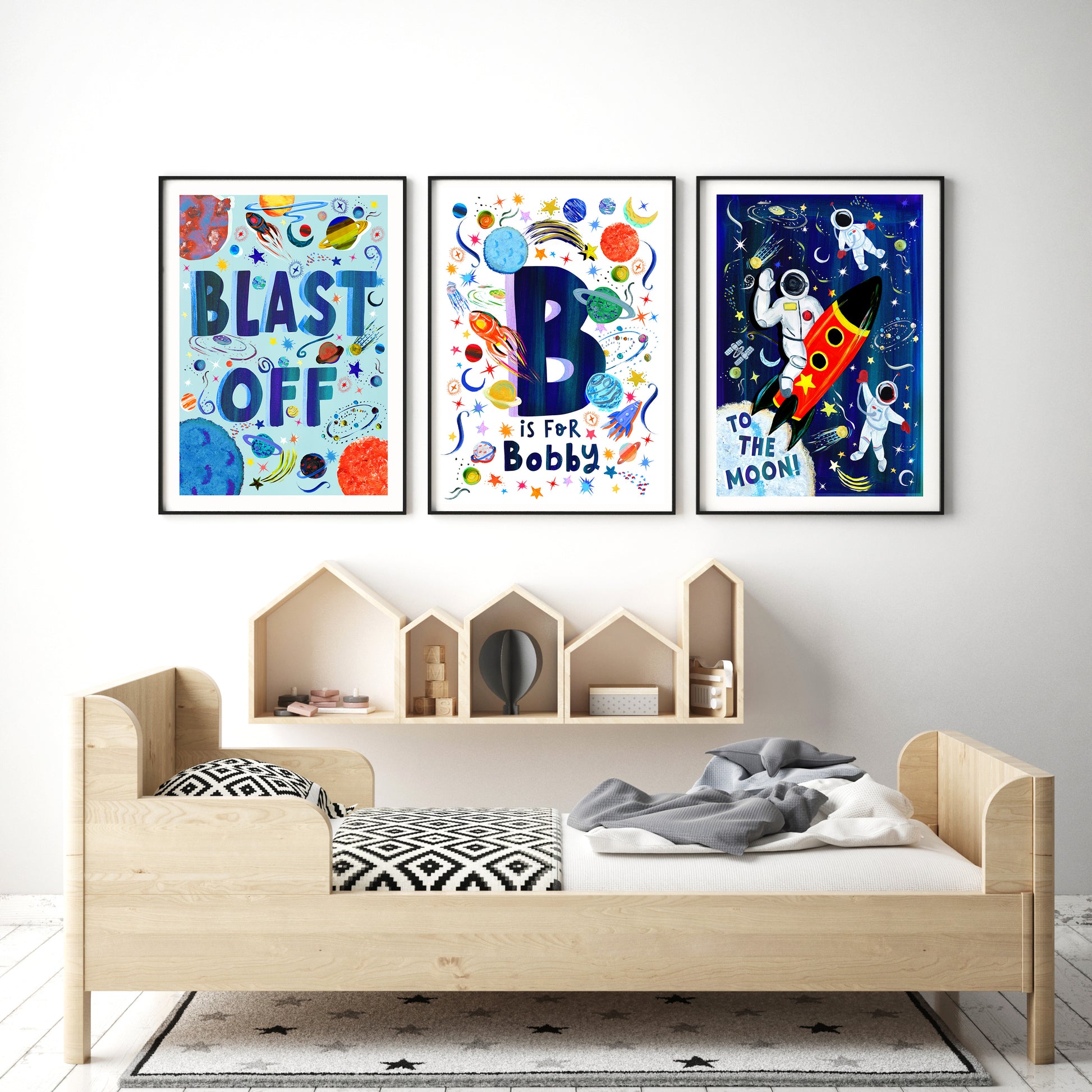 Older Boys kids room with personalised space prints set of 3 of the wall above bed