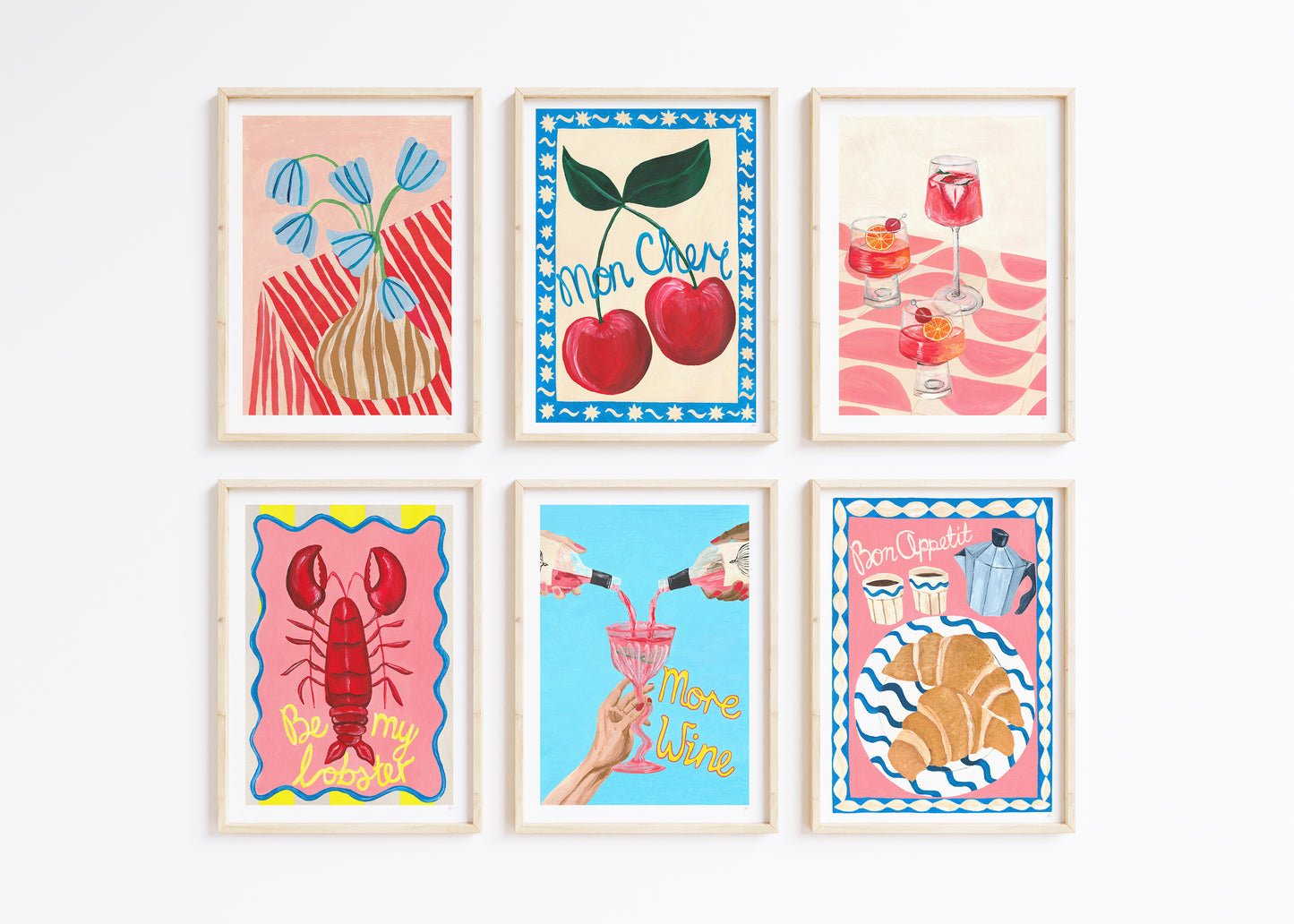 Set of six colorful framed artworks on a white wall