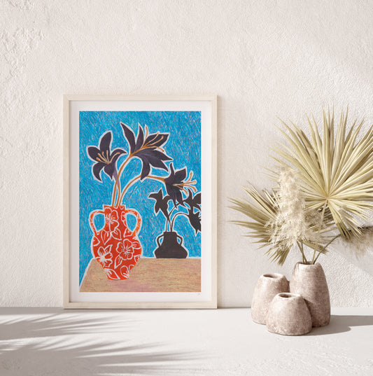 Framed artwork of floral design with vases on a white wall