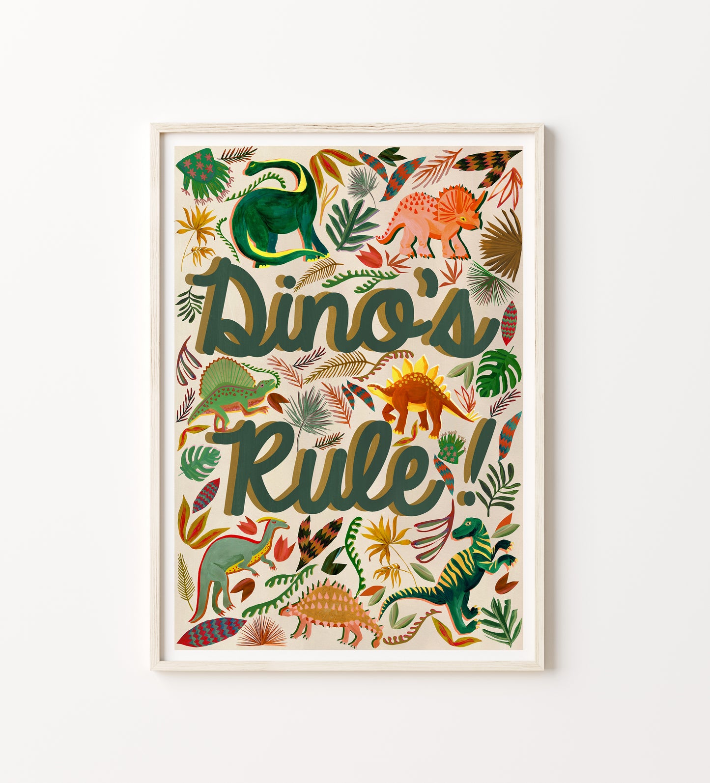 Framed artwork with colorful dinosaurs and the text 'Dino's Rule!' on a white background