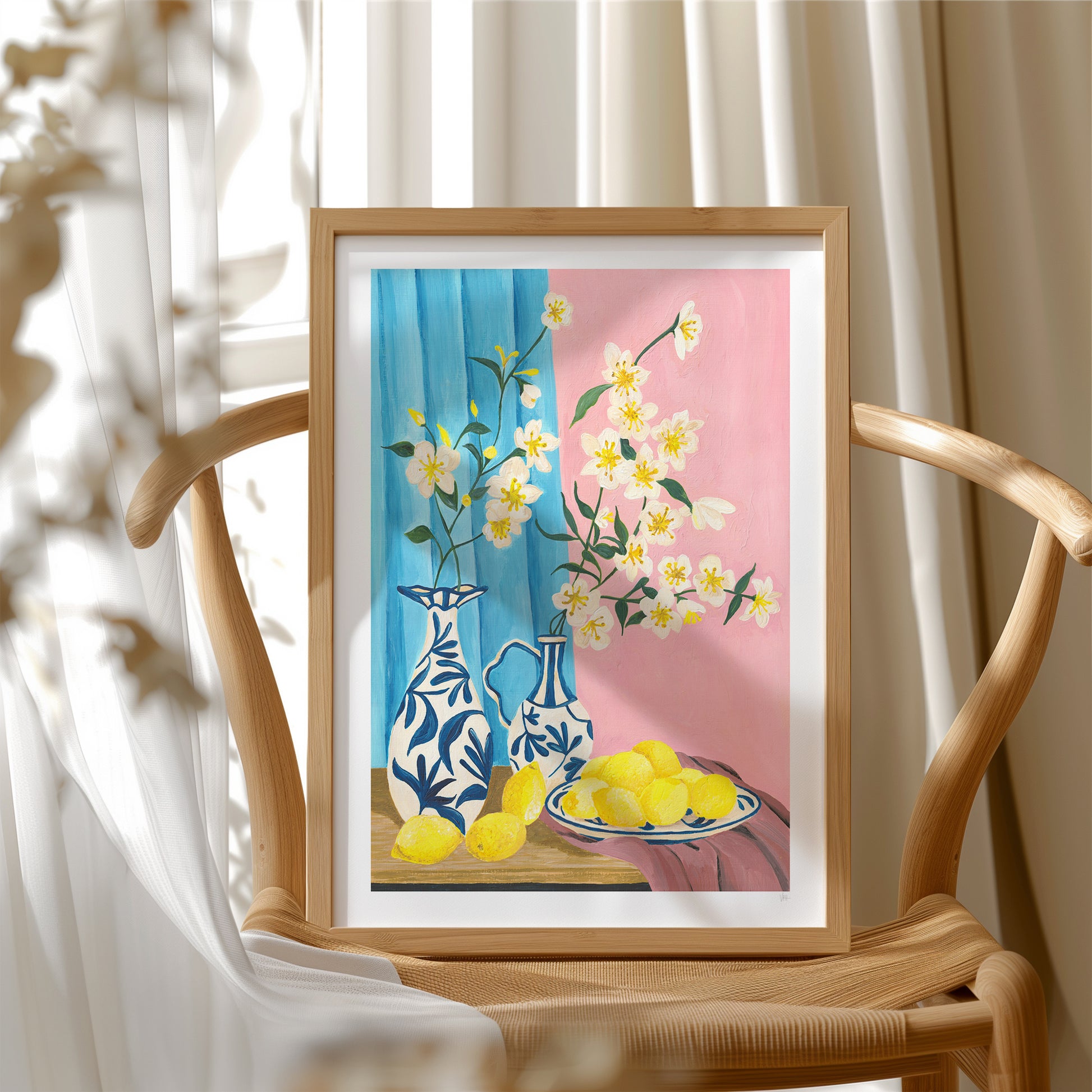 Framed artwork with floral and vase design on a wooden chair.