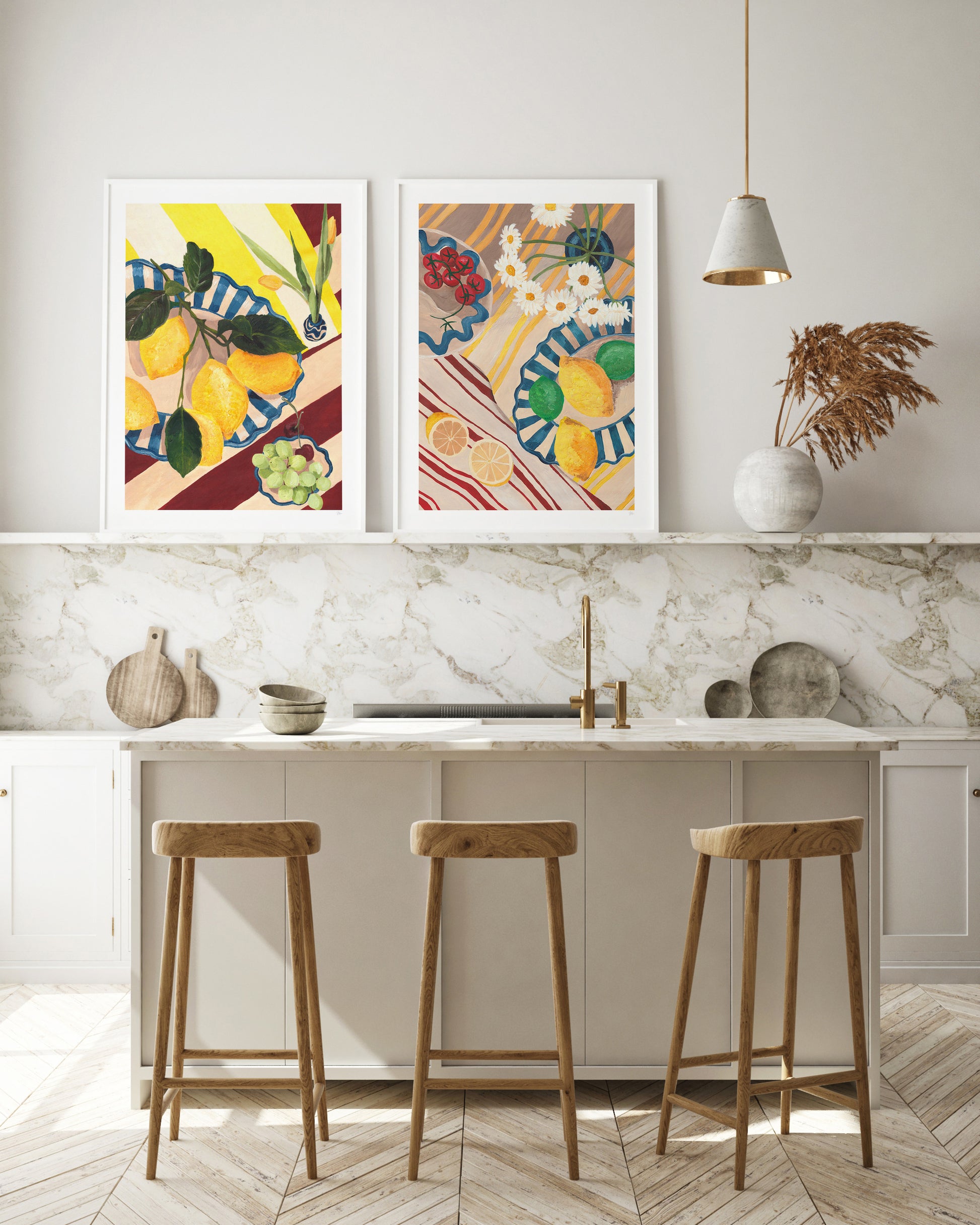 Modern kitchen with marble countertop, wooden stools, and colorful wall art.