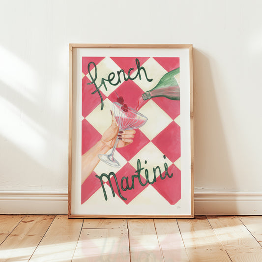 Framed artwork with 'French Martini' text and a checkered pattern on a wall.