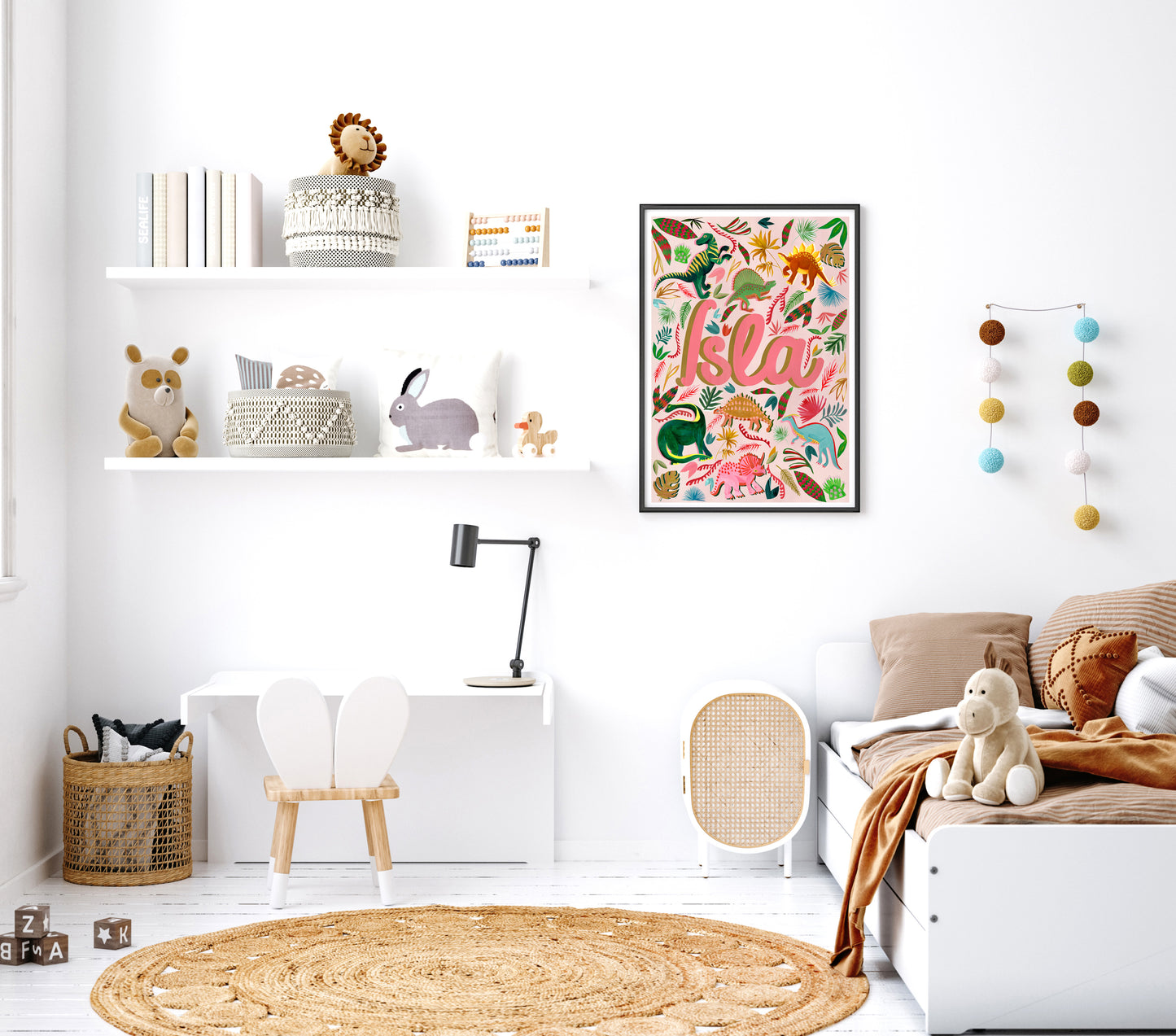 Children's room with shelves, toys, a rug, and a colorful dinosuar name wall art print.