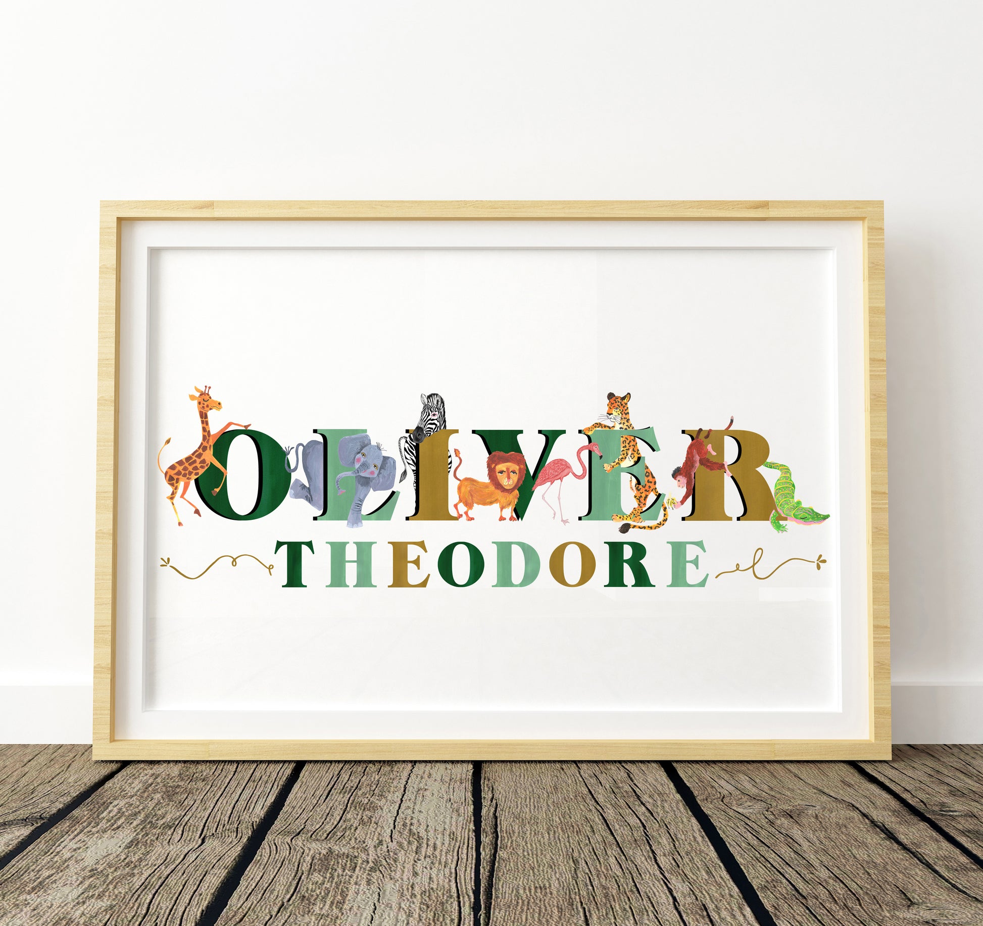 Framed artwork with colorful animal-themed letters spelling 'Oliver Theodore' on a white background.