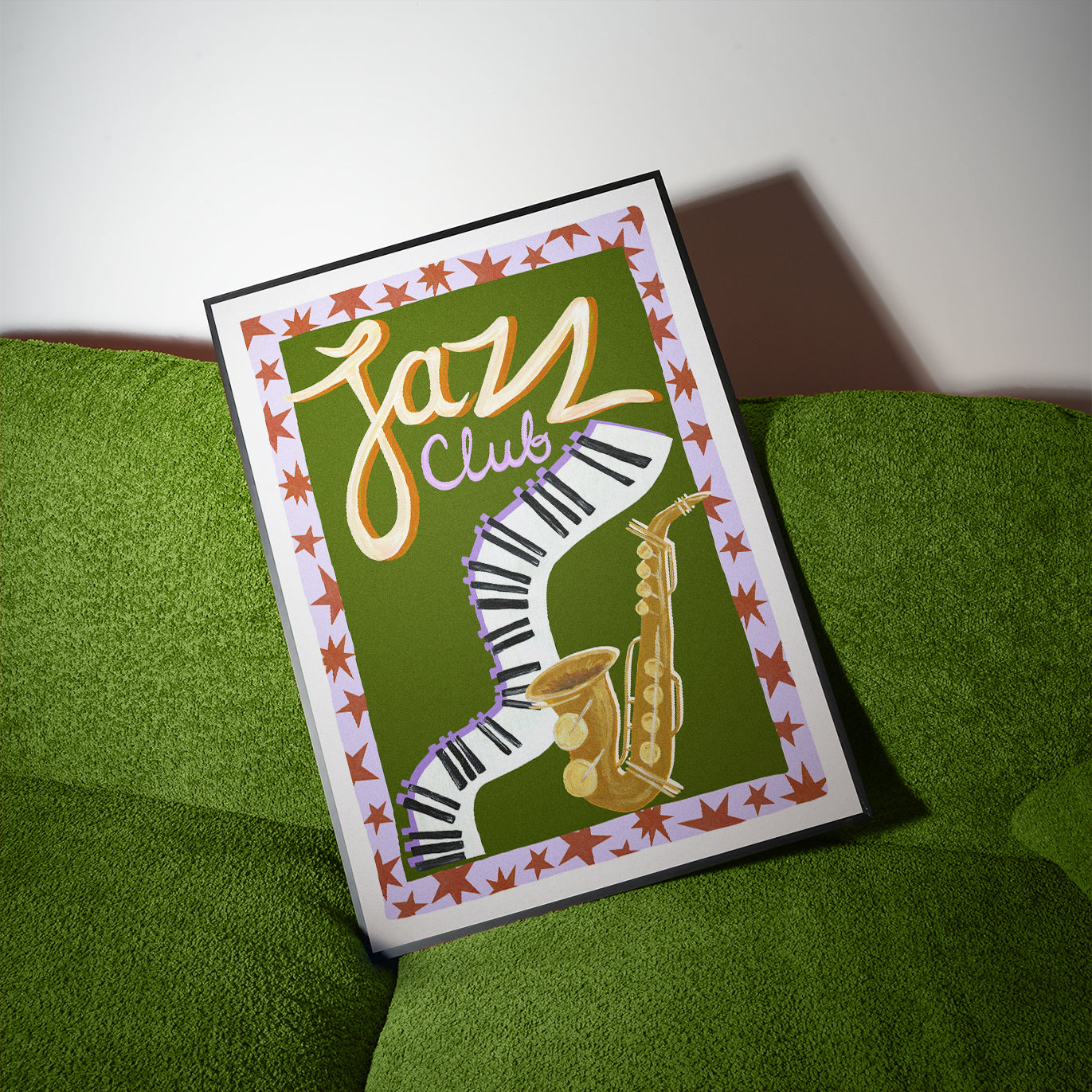 Poster with 'Jazz Club' text and a saxophone on a green surface