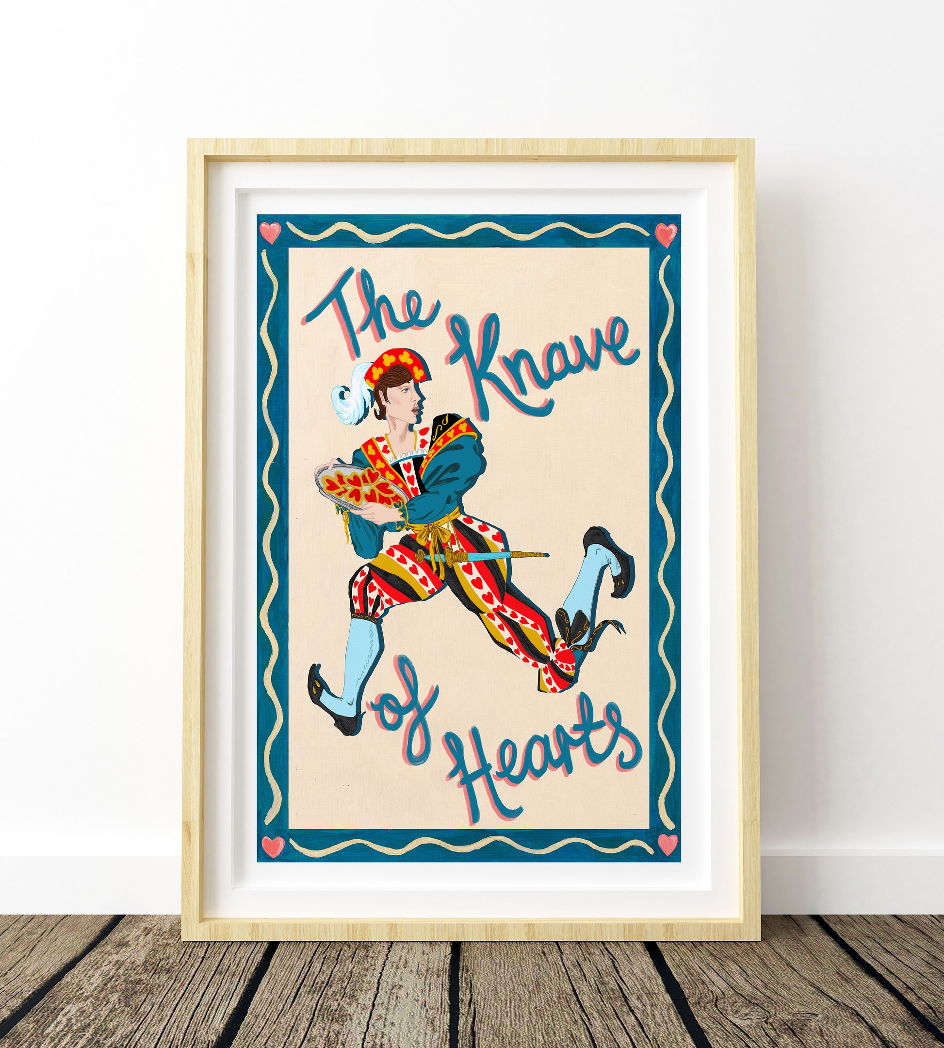 The Knave of hearts illustration in a light wood frame