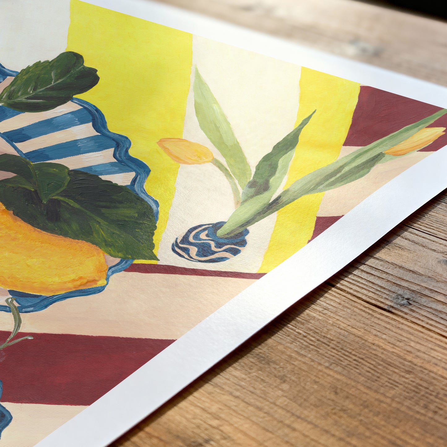Artistic depiction of plants on a colorful background on a wooden surface