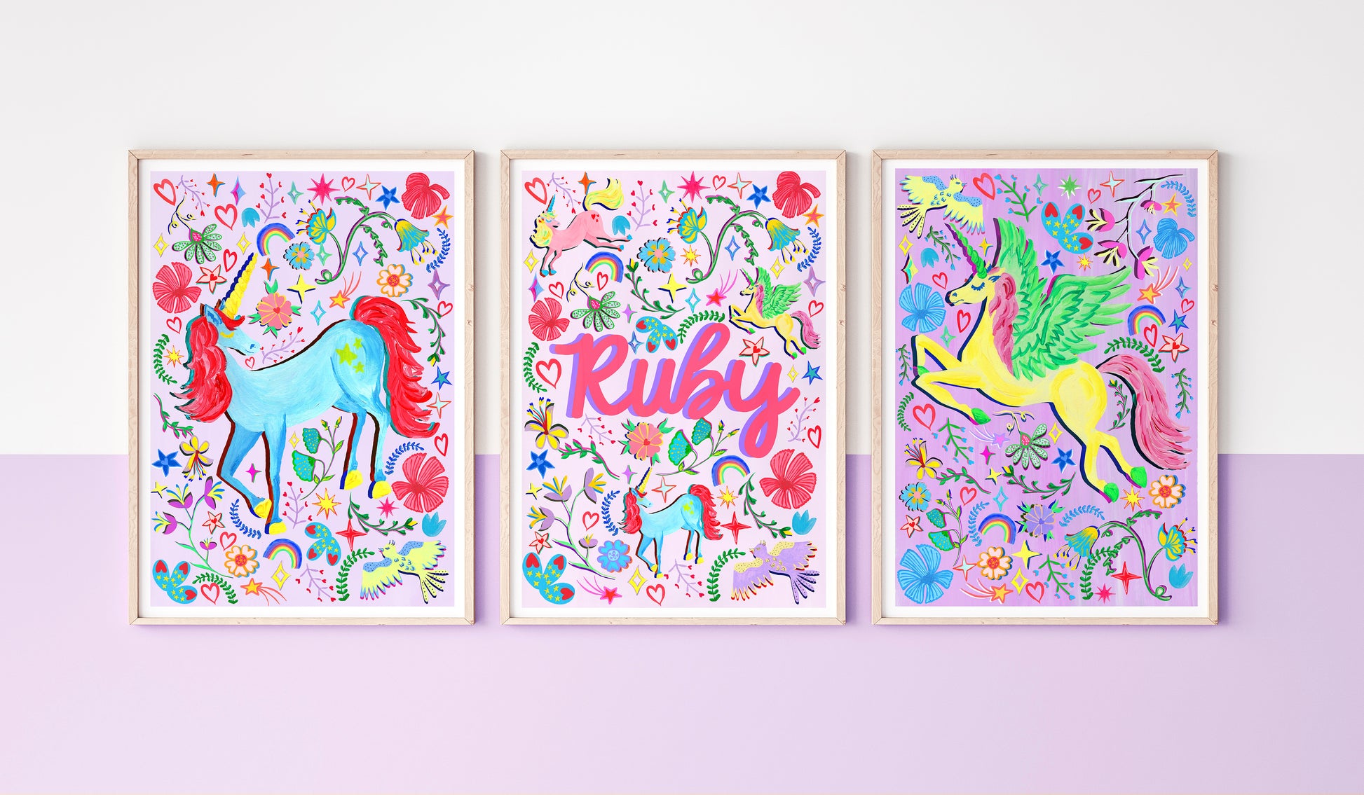Three colorful prints with unicorns and flowers on a light purple background