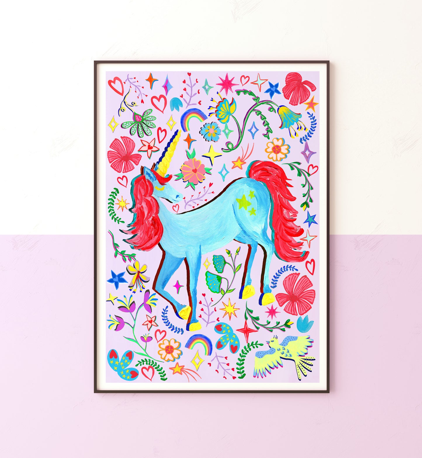 A colourful blue unicorn painting on a lilac bakground in a black frame placed on a lilac and white wall.