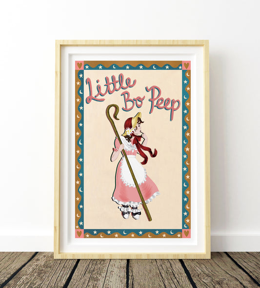 Framed artwork of a character from 'Little Bo Peep' with a wooden frame on a wooden floor.