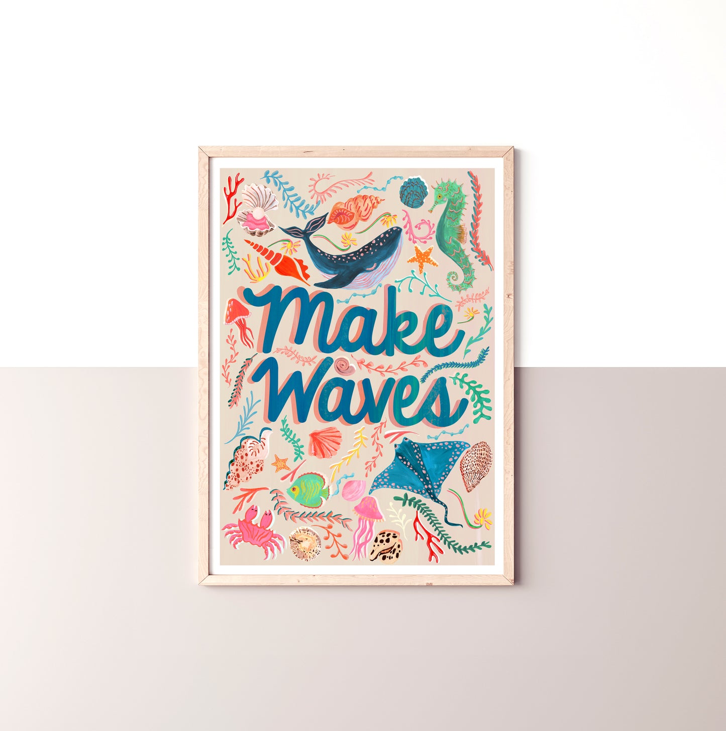Framed artwork with 'Make Waves' text and ocean-themed illustrations on a white background