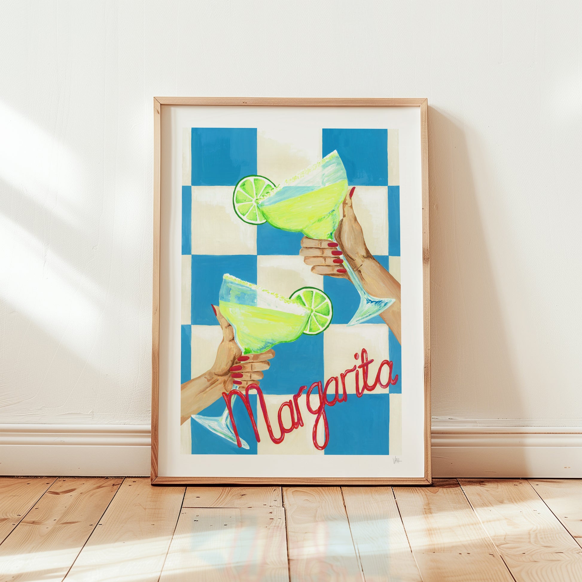 Framed artwork of hands holding margaritas with a blue and white checkered background.