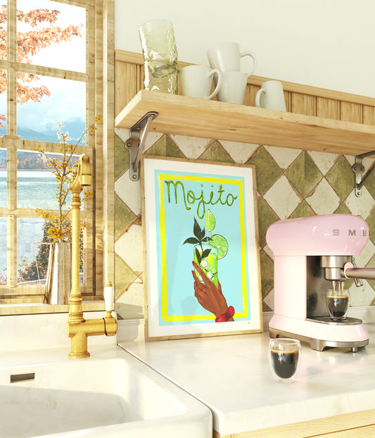 Kitchen counter with pink Smeg coffee machine, framed artwork, and window view.