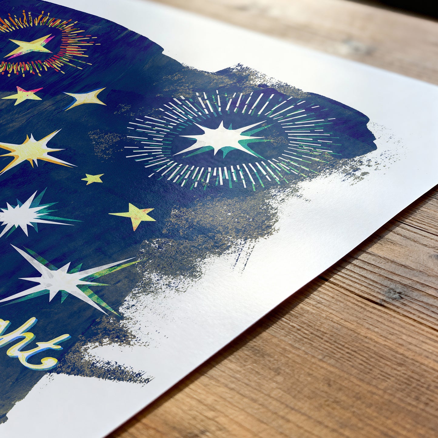 Artistic depiction of a starry night sky with stars on a piece of paper.