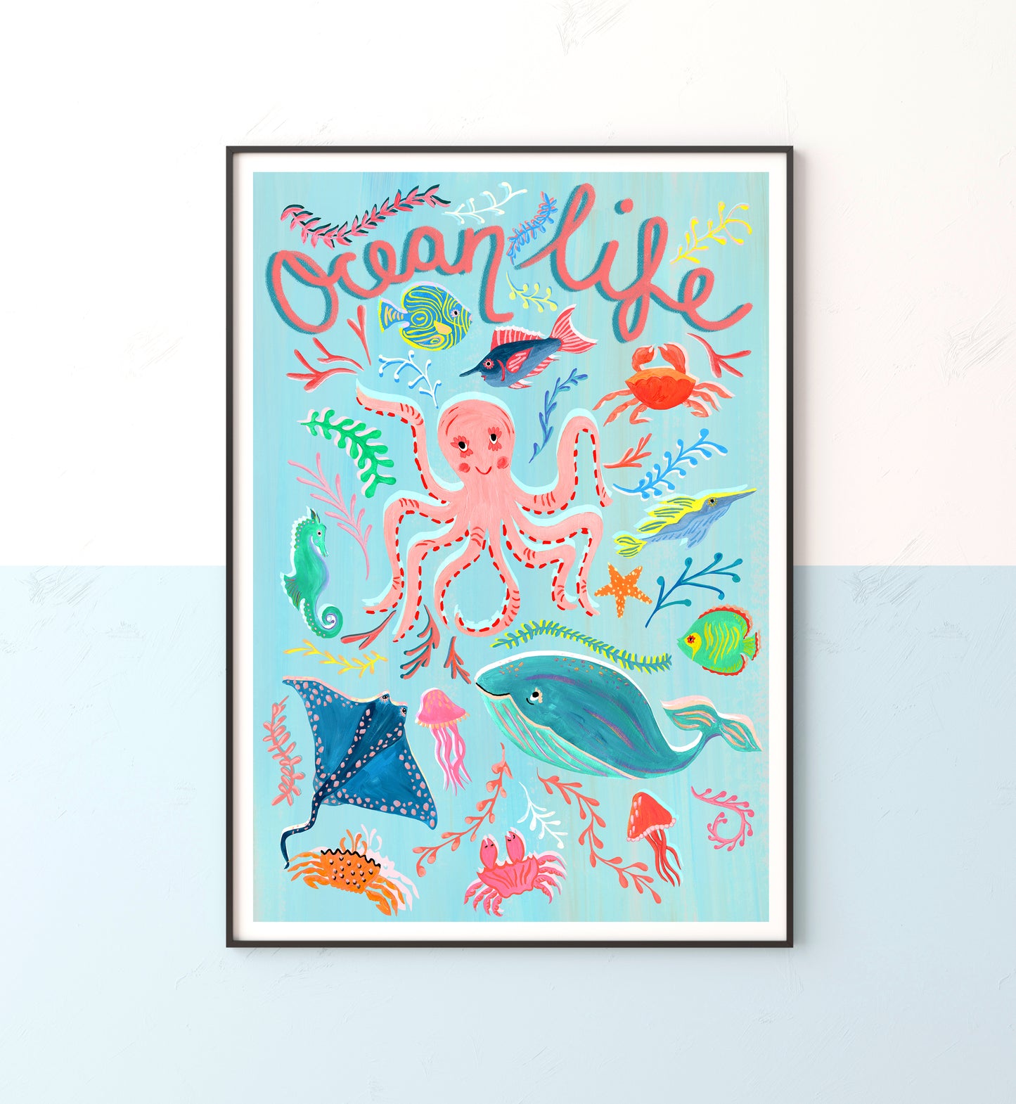 Colorful illustration of ocean life with 'Ocean Life' text on a light blue background.