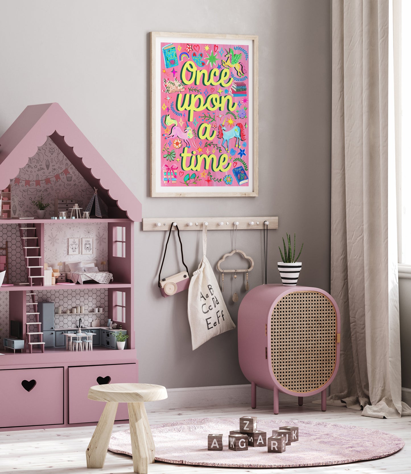 Children's room with pink dollhouse, 'Once upon a time' poster, and decorative items.