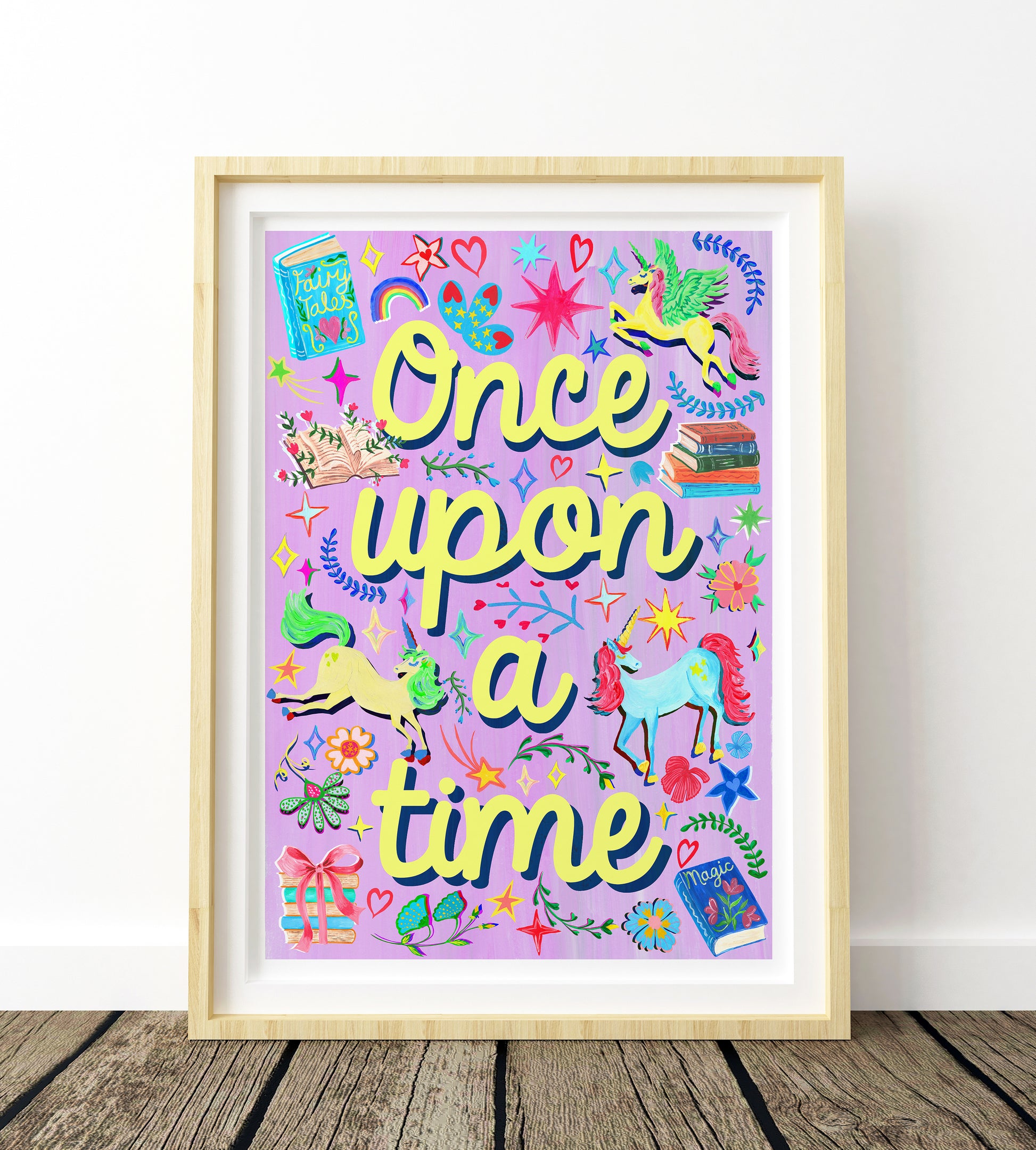 Framed artwork with 'Once upon a time' text and colorful illustrations on a purple background.