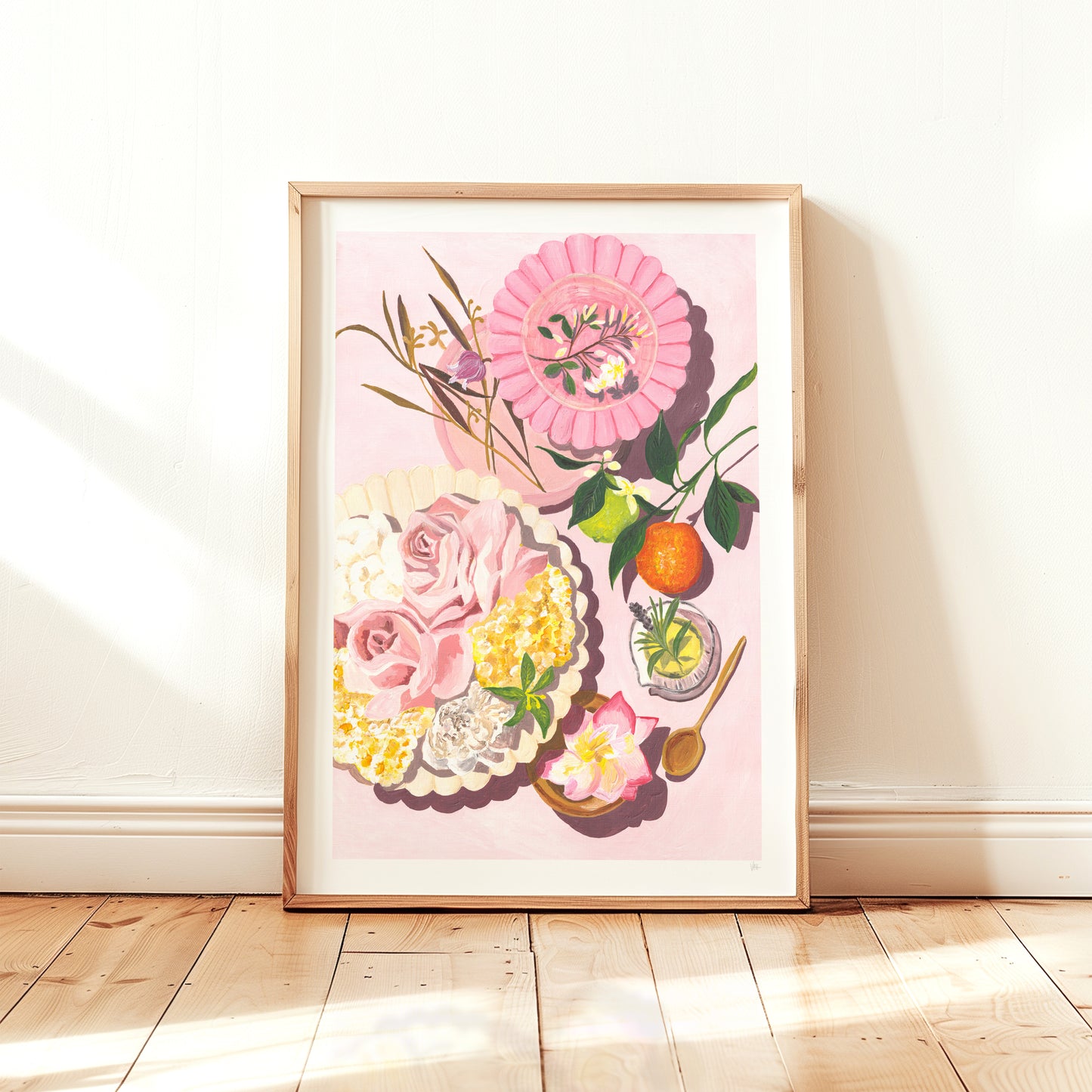 Framed floral artwork on a light pink background with wooden frame
