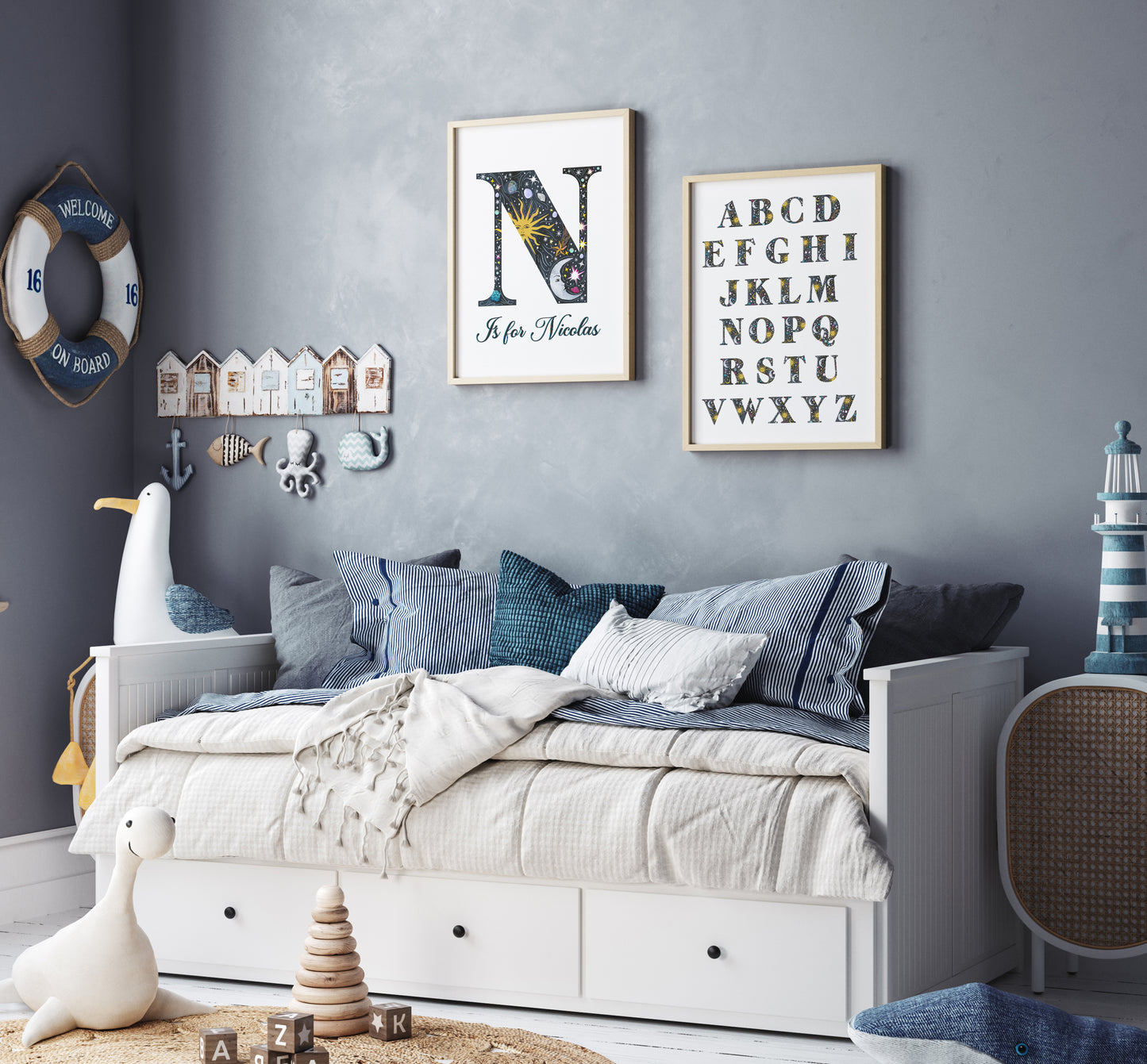 Children's bedroom with a white bed, decorative pillows, and wall art.