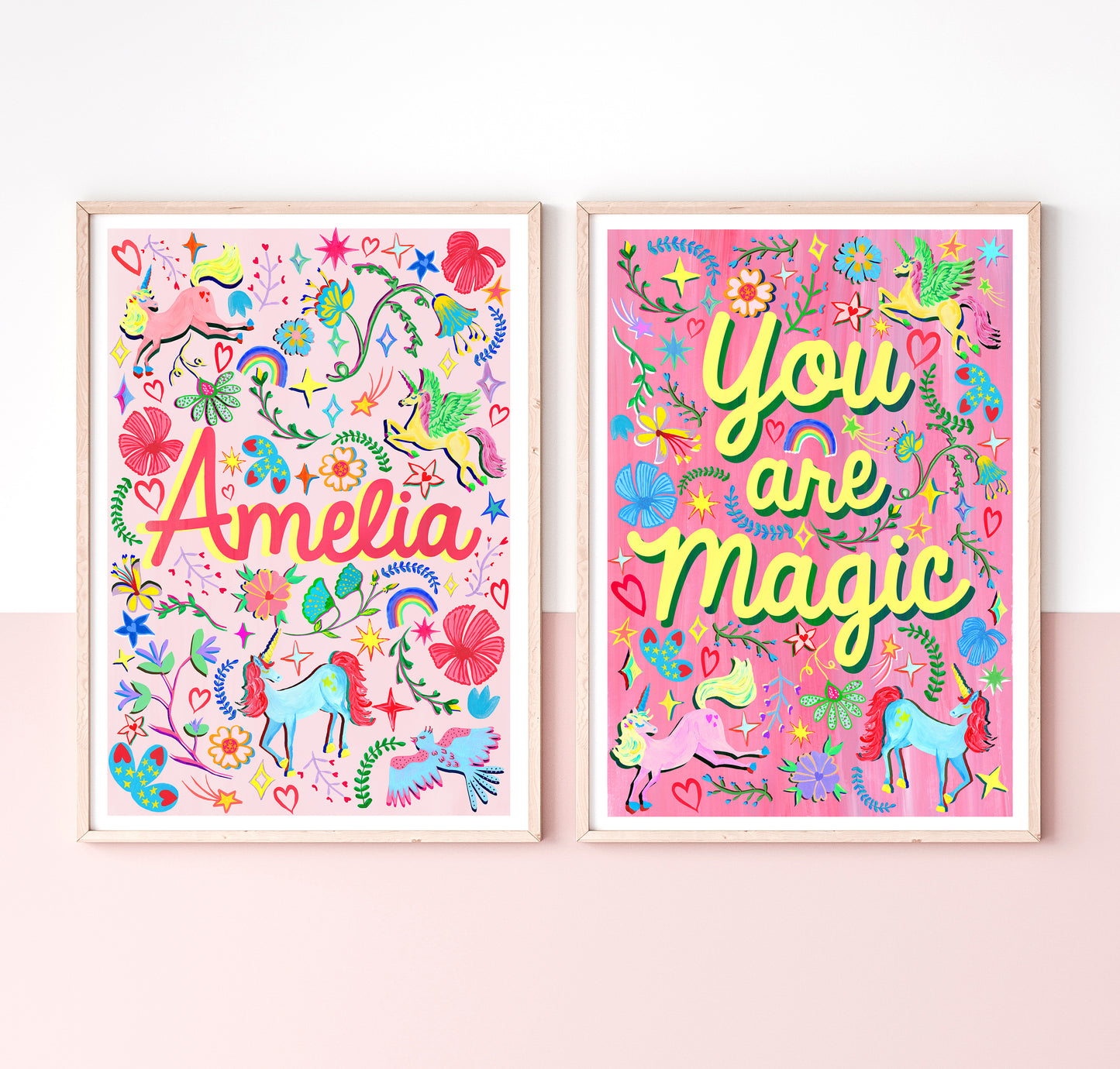 Two colorful children's posters with 'Amelia' and 'You are Magic' text on a pink background.