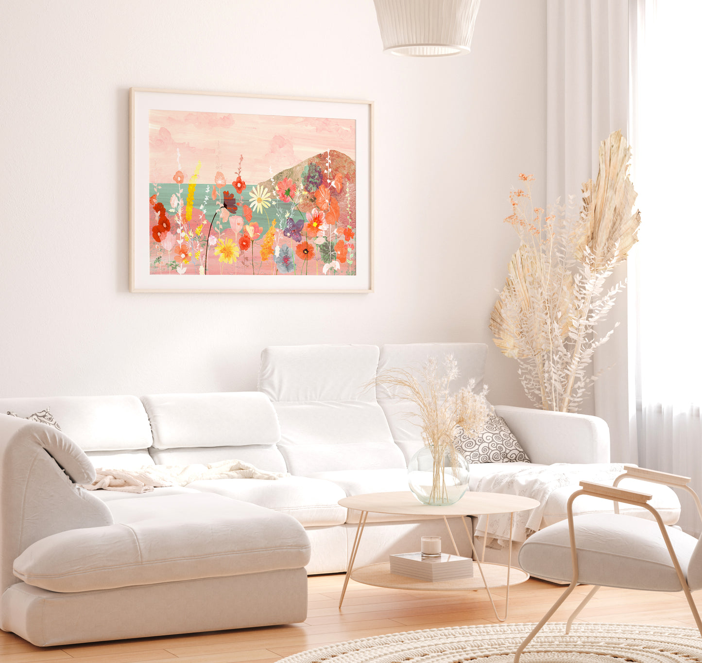 Modern living room with white sofa, coffee table, and decorative elements.