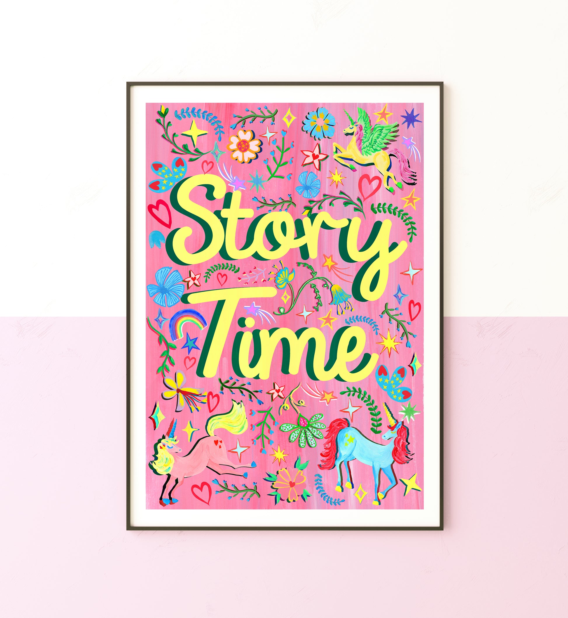 Framed artwork with 'Story Time' text and colorful illustrations on a pink background