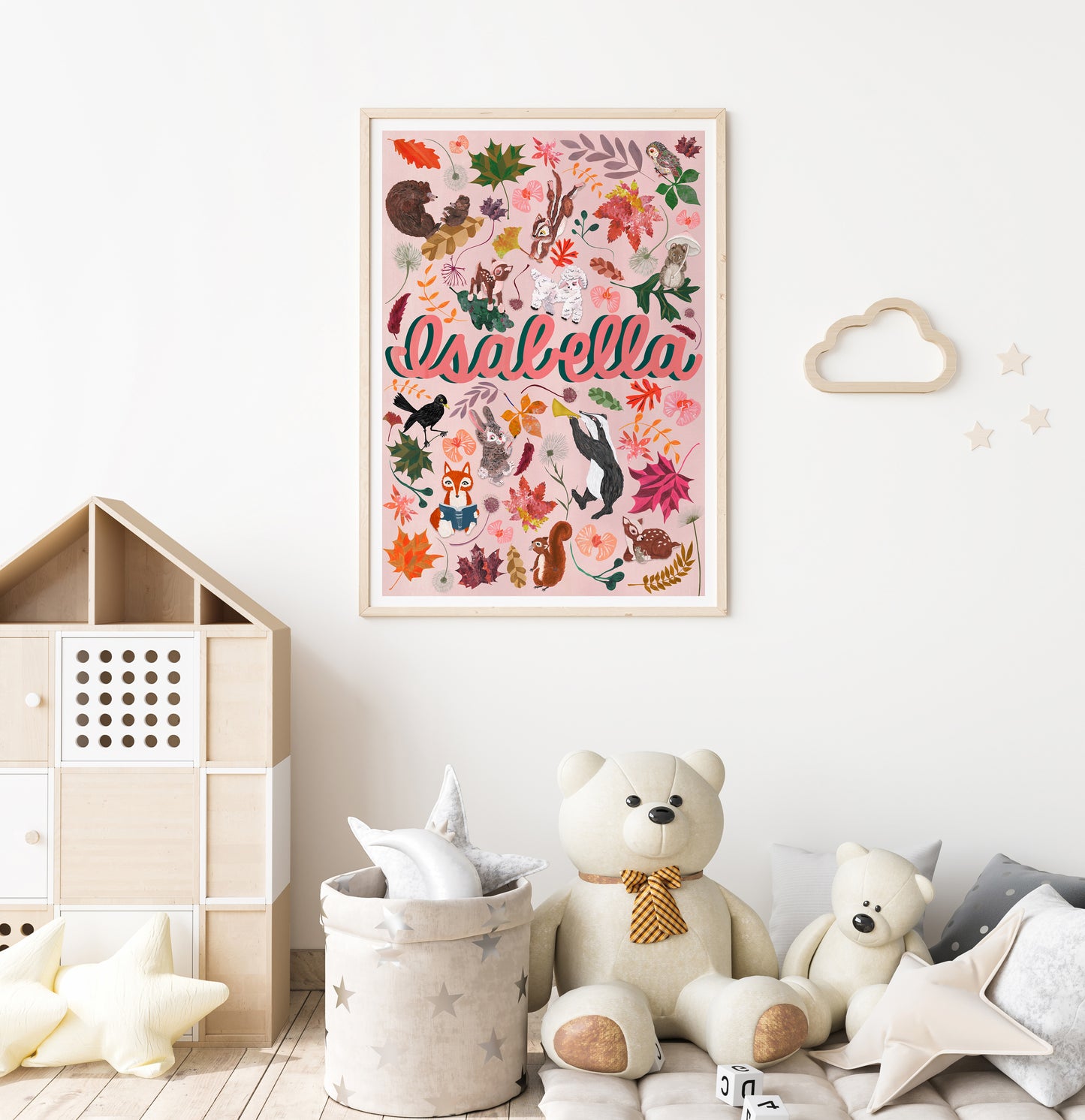 Children's room with a floral name print, teddy bear, and storage basket.