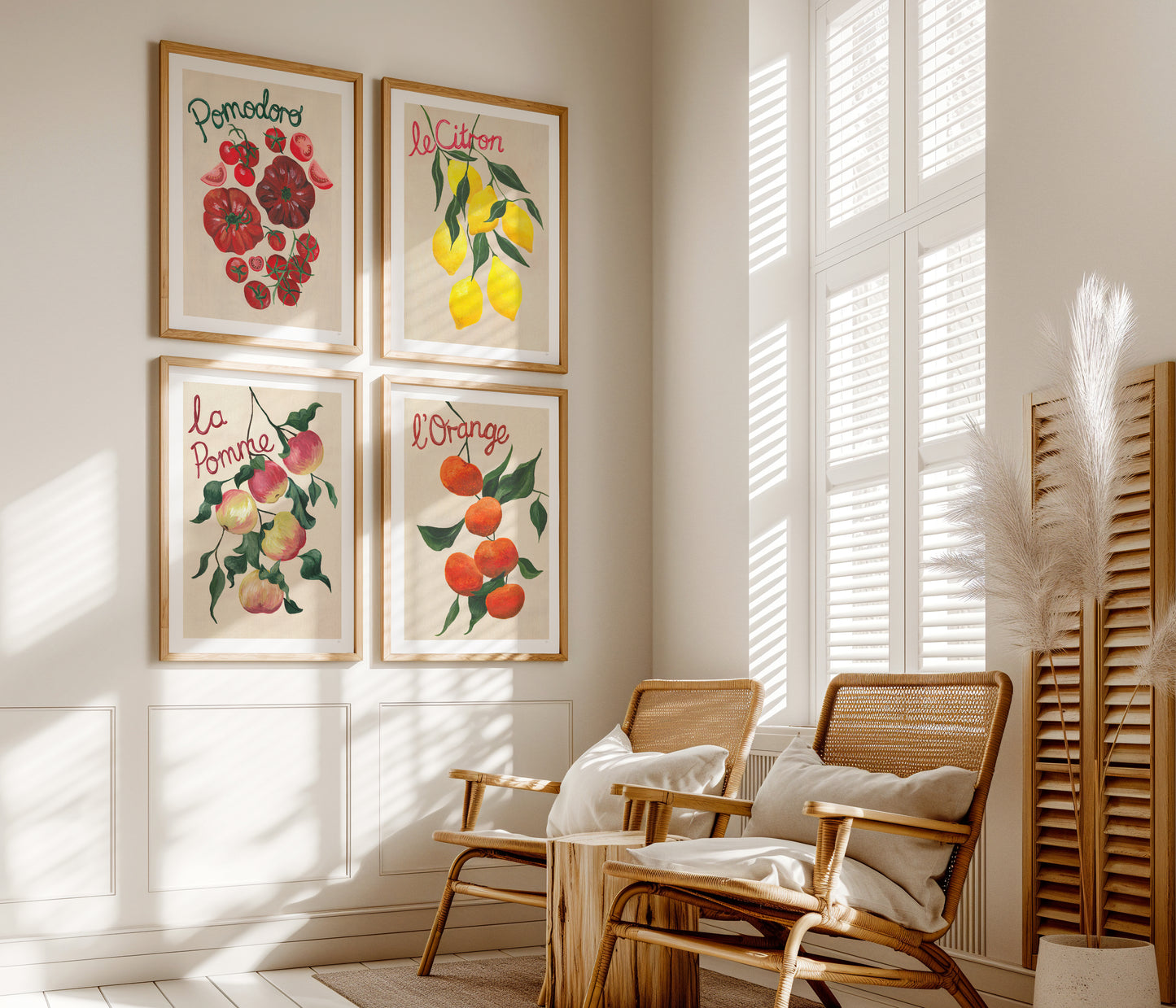 Living room with framed fruit prints on the wall and wooden chairs.