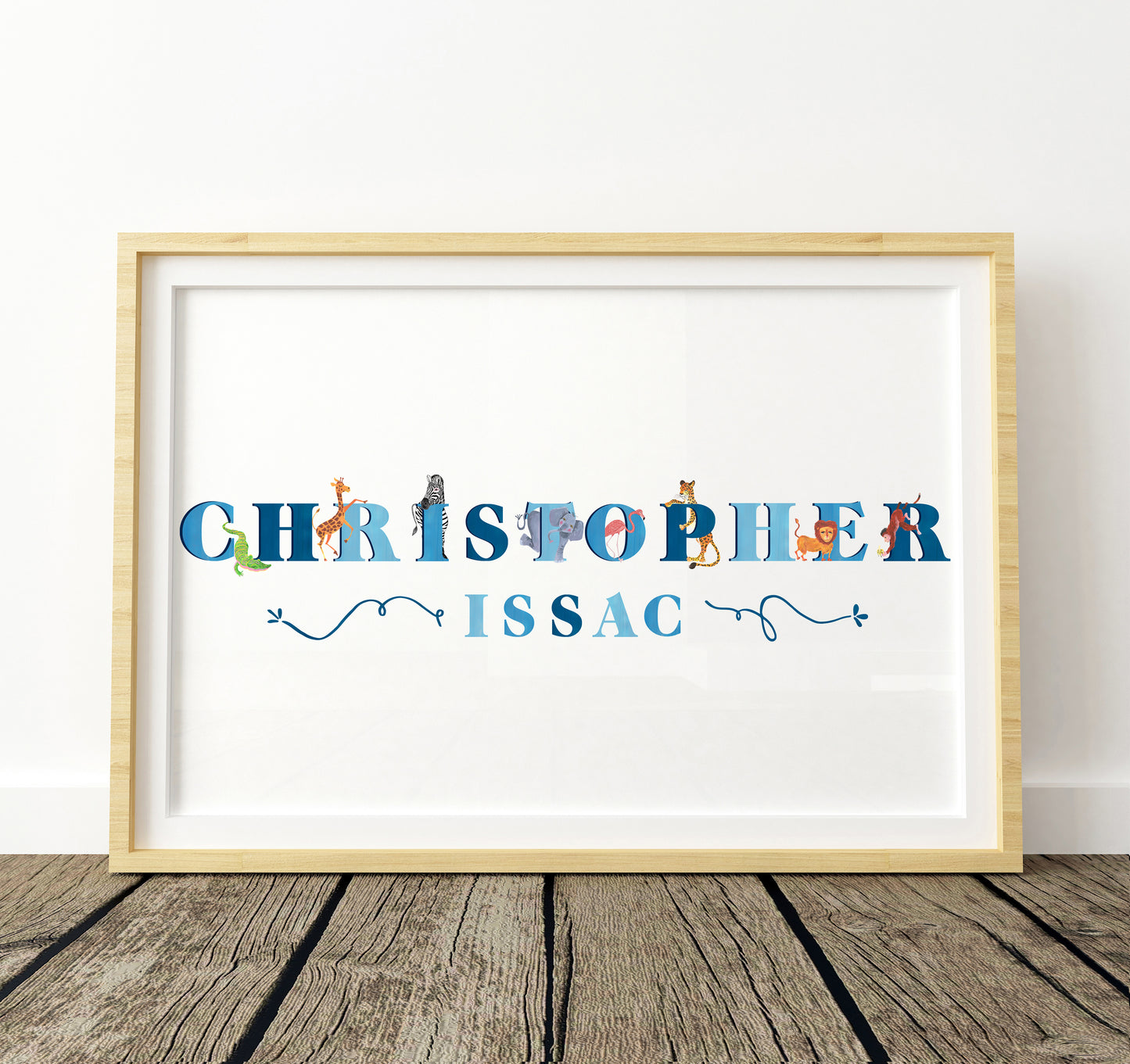 Framed artwork with 'Christopher Issac' in colorful letters and safari animal illustrations on a white background