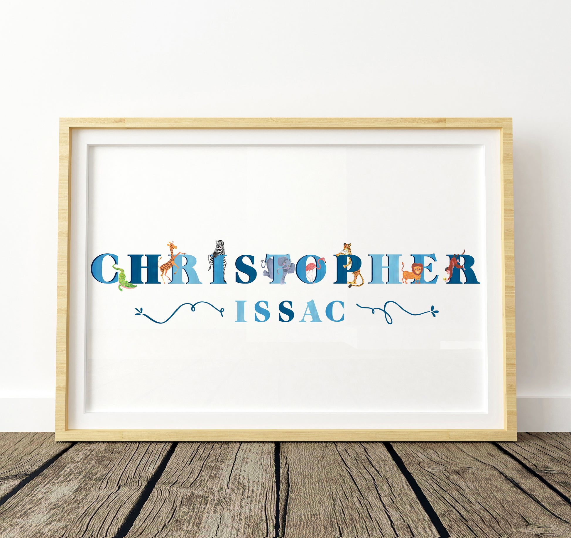 Framed artwork with 'Christopher Issac' in colorful letters and safari animal illustrations on a white background