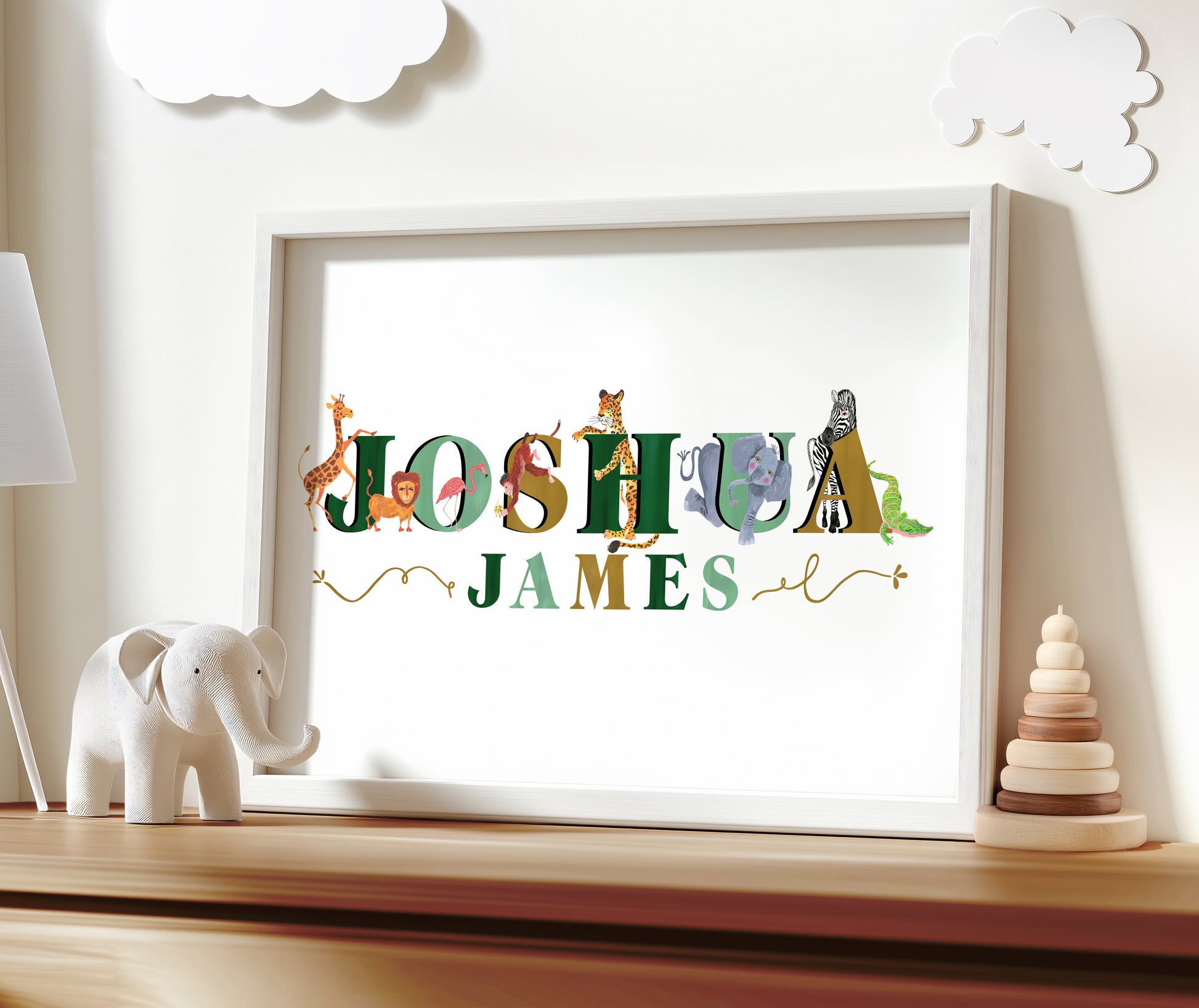 Framed artwork with 'Joshua James' on a shelf with decorative items