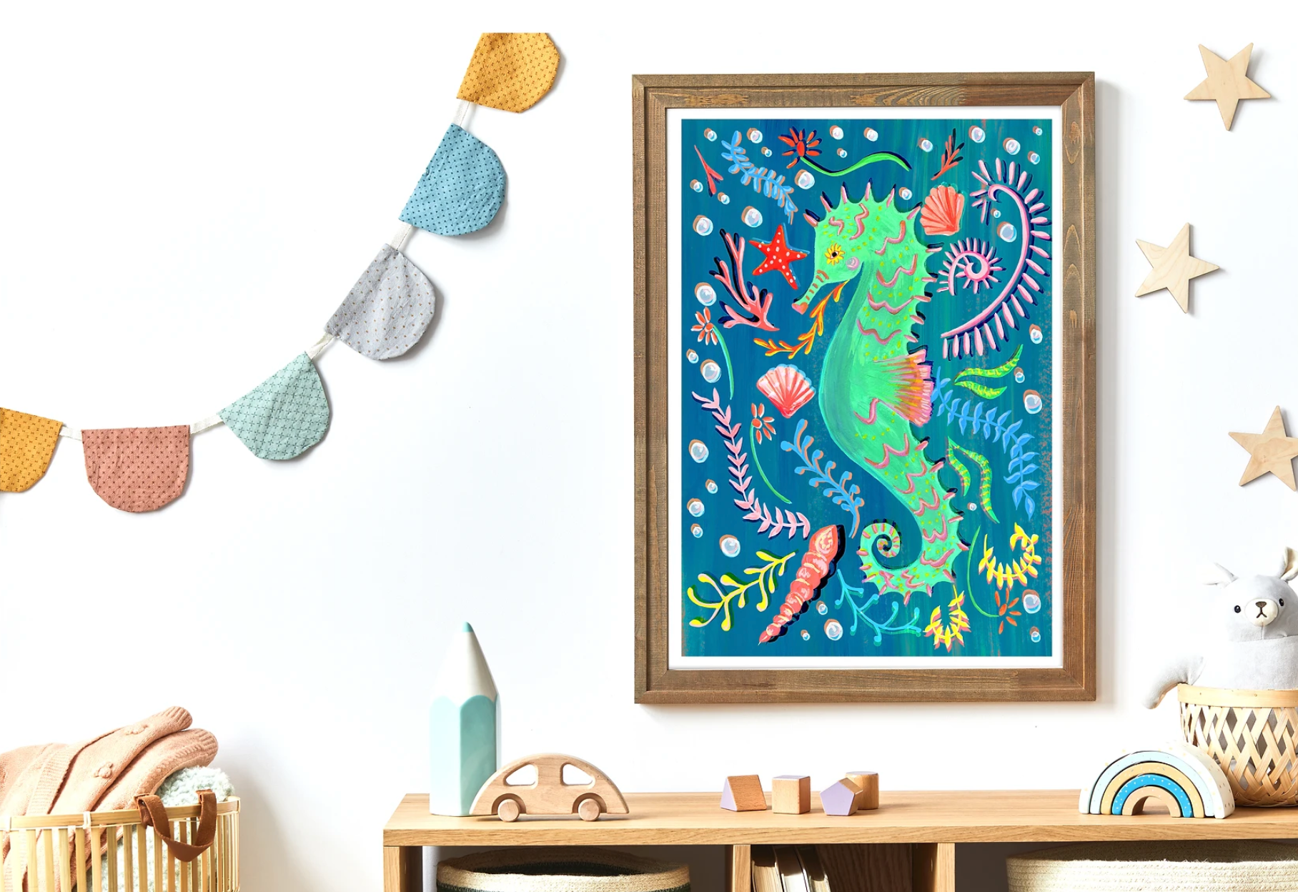 Colorful framed artwork of a seahorse on a wall with decorative elements.