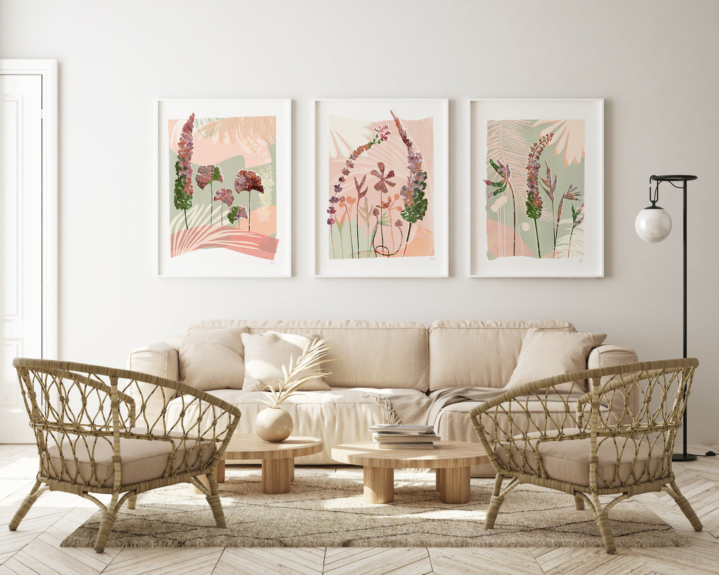 Living room with beige sofa, wicker chairs, and floral wall art.