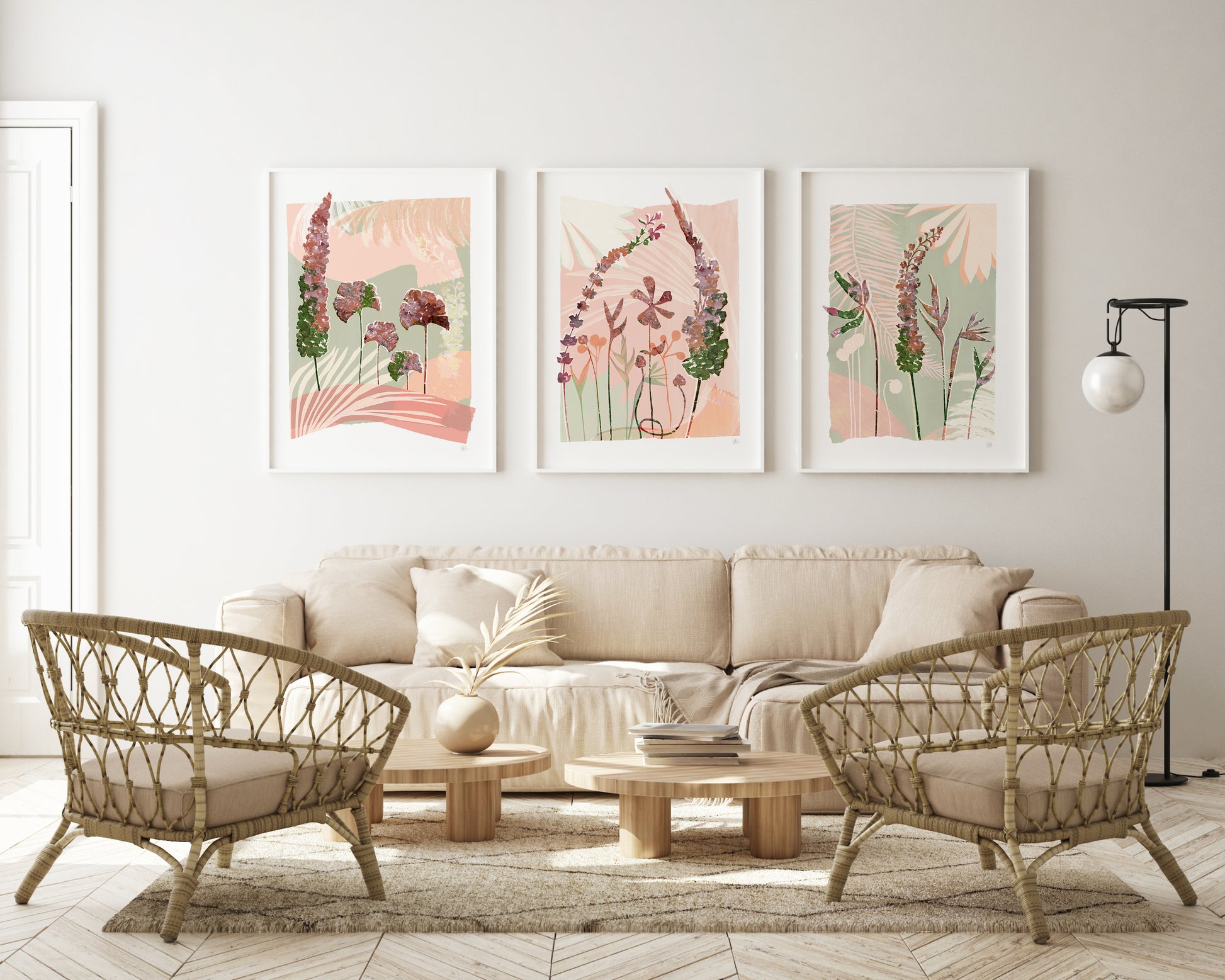 Living room with beige sofa, wicker chairs, and floral wall art.
