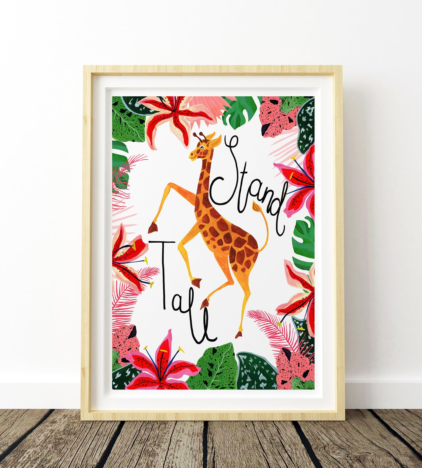 Framed artwork with a giraffe and floral design on a white background