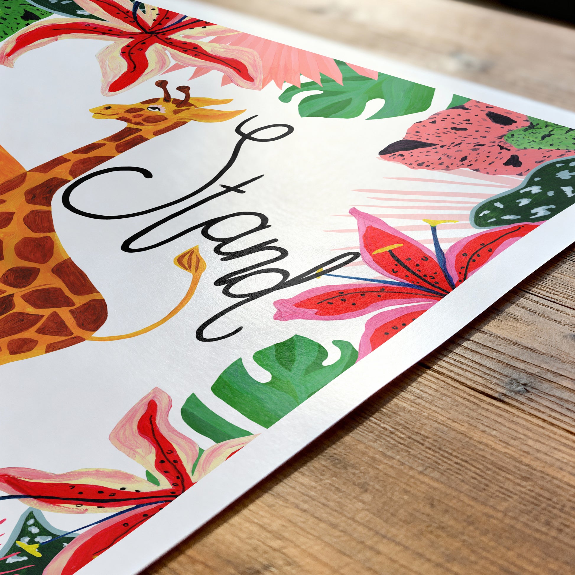 Colorful illustration of a giraffe, flowers, and leaves on a wooden surface