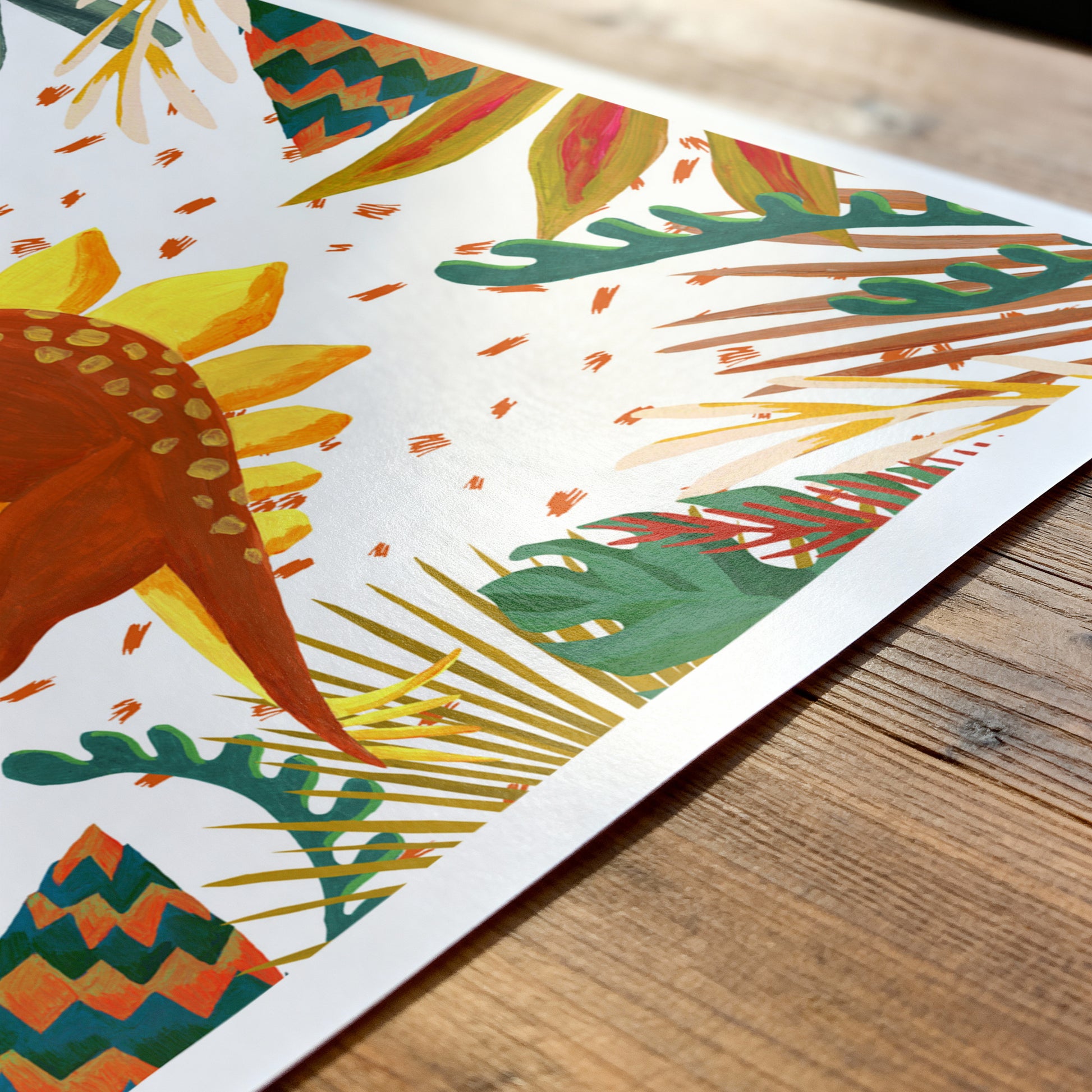 Colorful abstract art print on a wooden surface